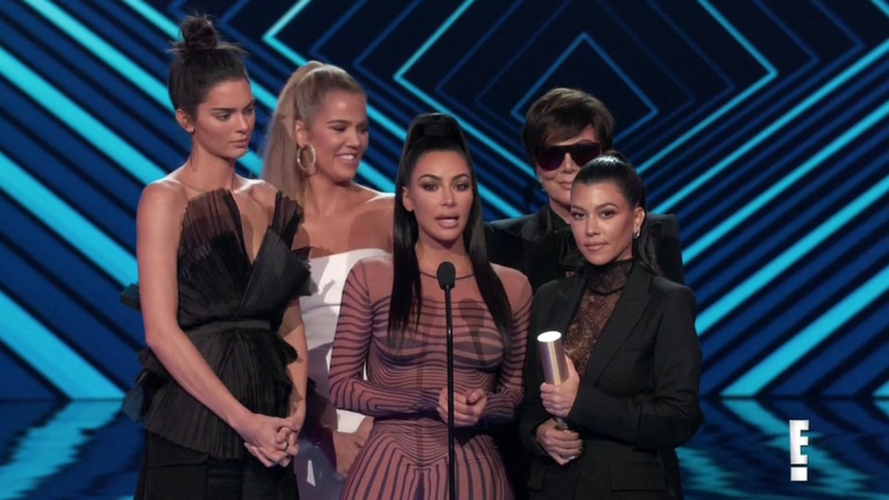 The Kardashians dedicate their People's Choice Award win to 'first responders' after being forced to flee home amid wildfires in Los Angeles