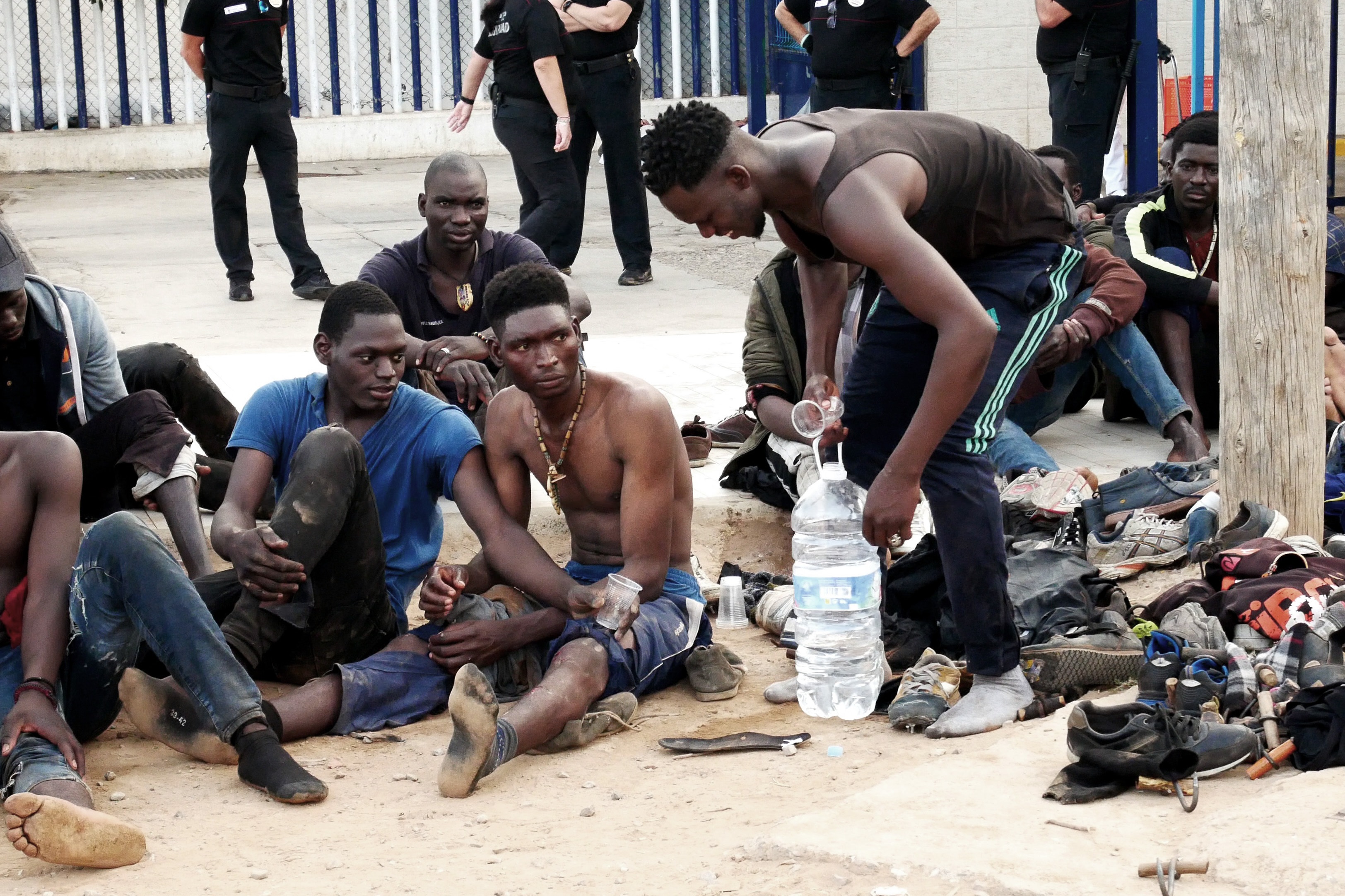 Some 300 migrants manage to reach Spain by jumping border fence in Melilla