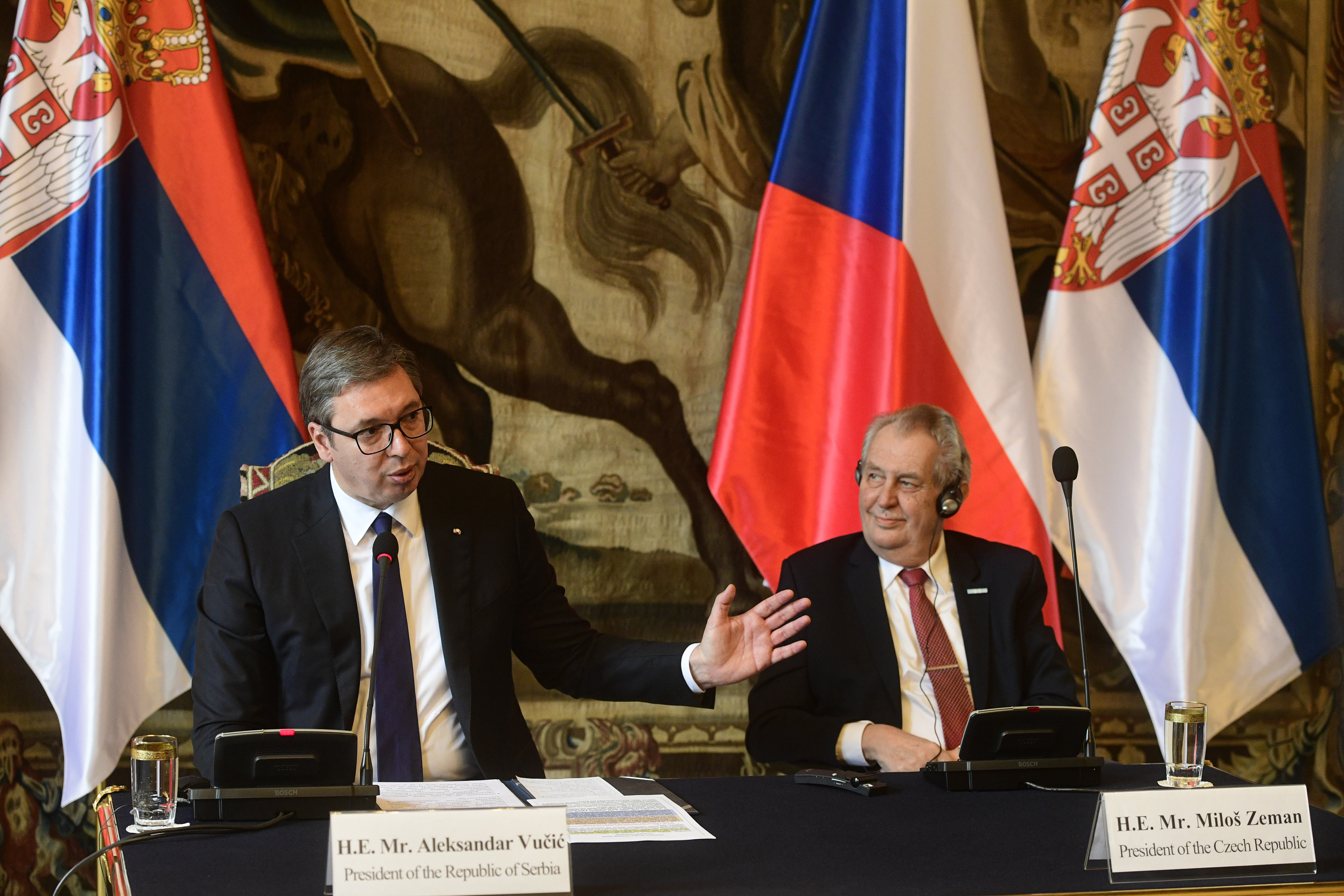 Serbian President Aleksandar Vucic, left, speaks during a media conference after a meeting with Czech President Milos Zeman, right, at Prague Castle, Prague, Czech Republic, Tuesday, May 18, 2021. (AP Photo via CTK/Roman Vondrous) SLOVAKIA OUT