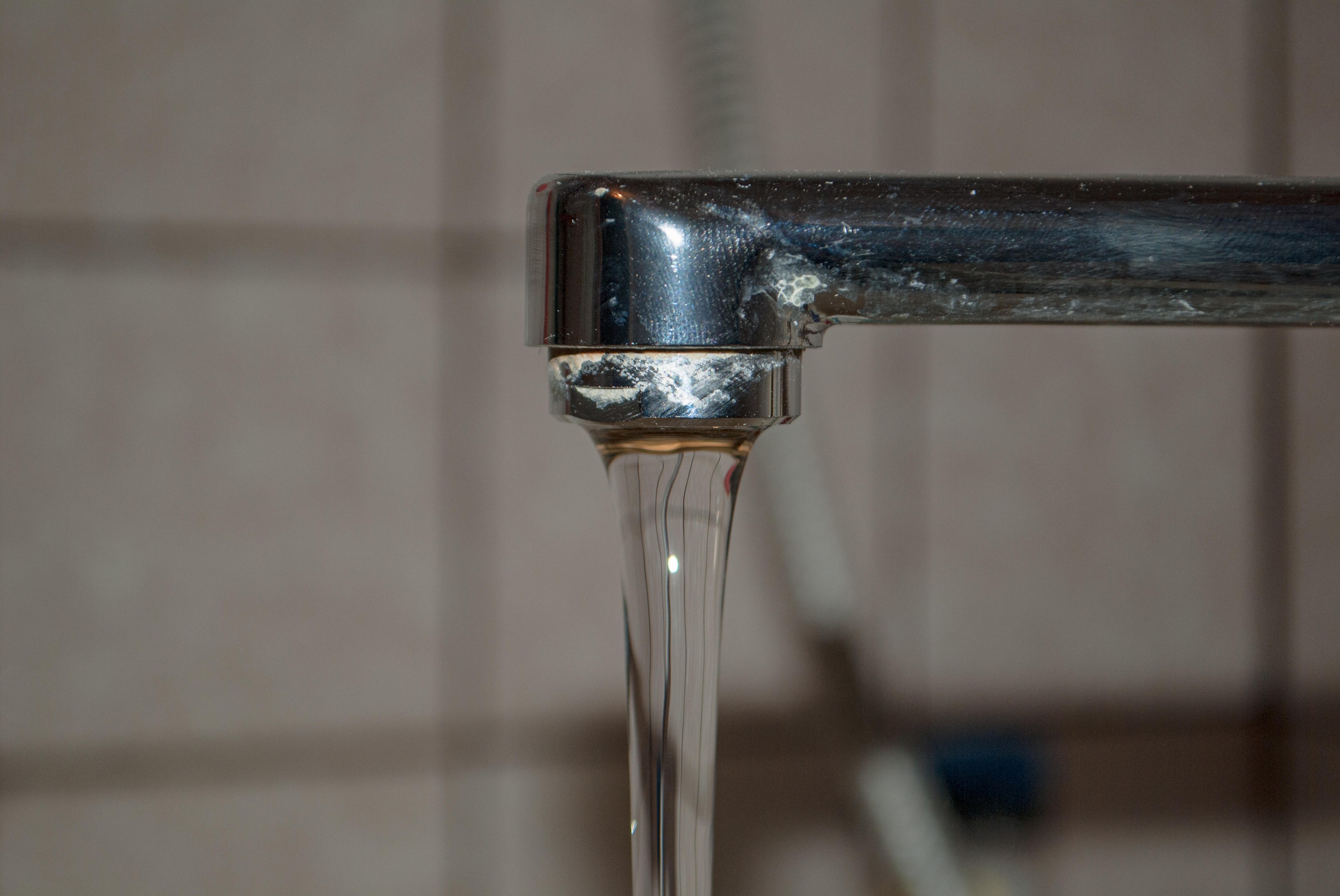 open water tap with selective running water in the bathroom