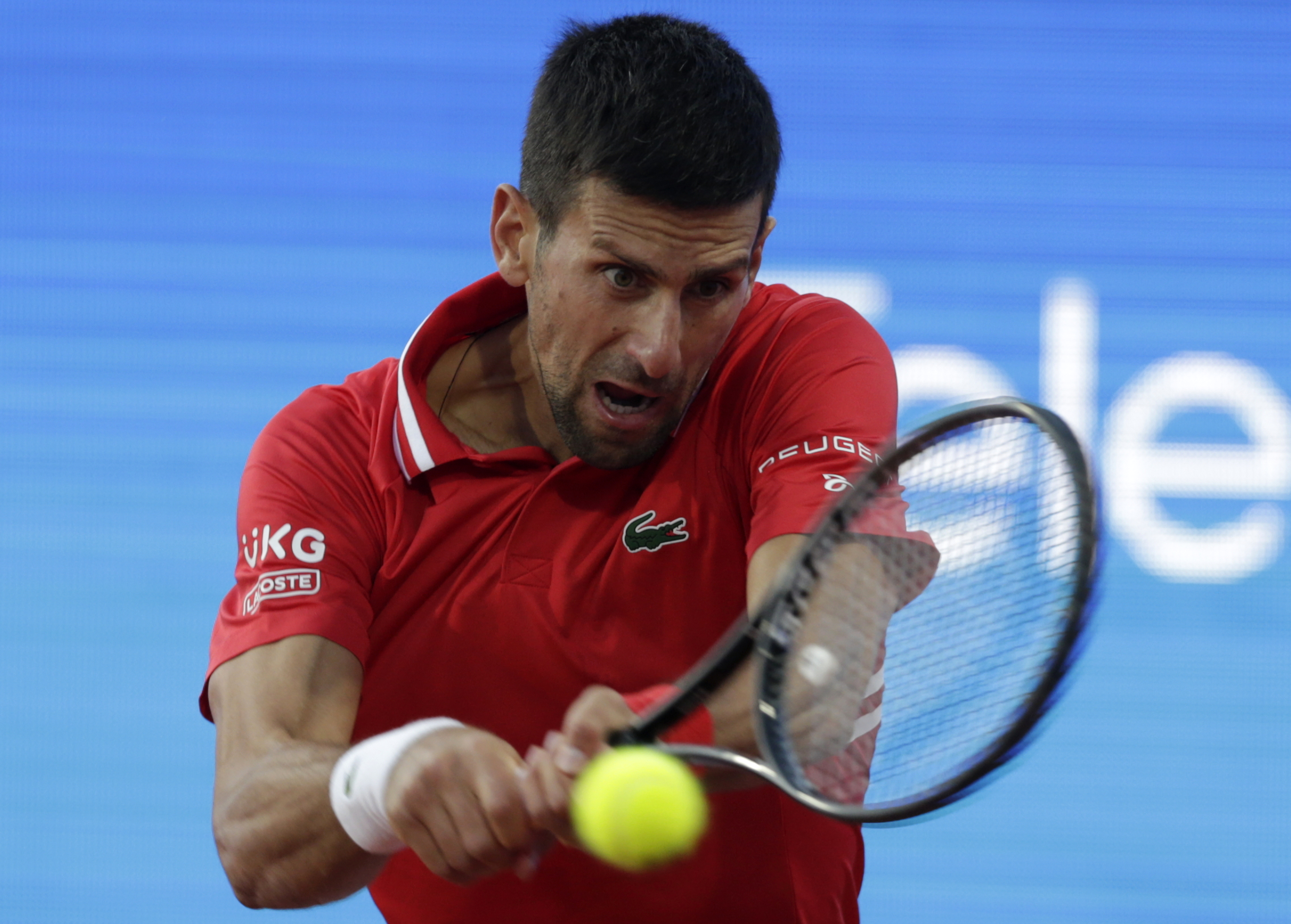 epa09157234 Novak Djokovic of Serbia in action against Aslan Karatsev of Russia during their semi final match of the Serbia Open tennis tournament in Belgrade, Serbia, 24 April 2021.  EPA-EFE/ANDREJ CUKIC