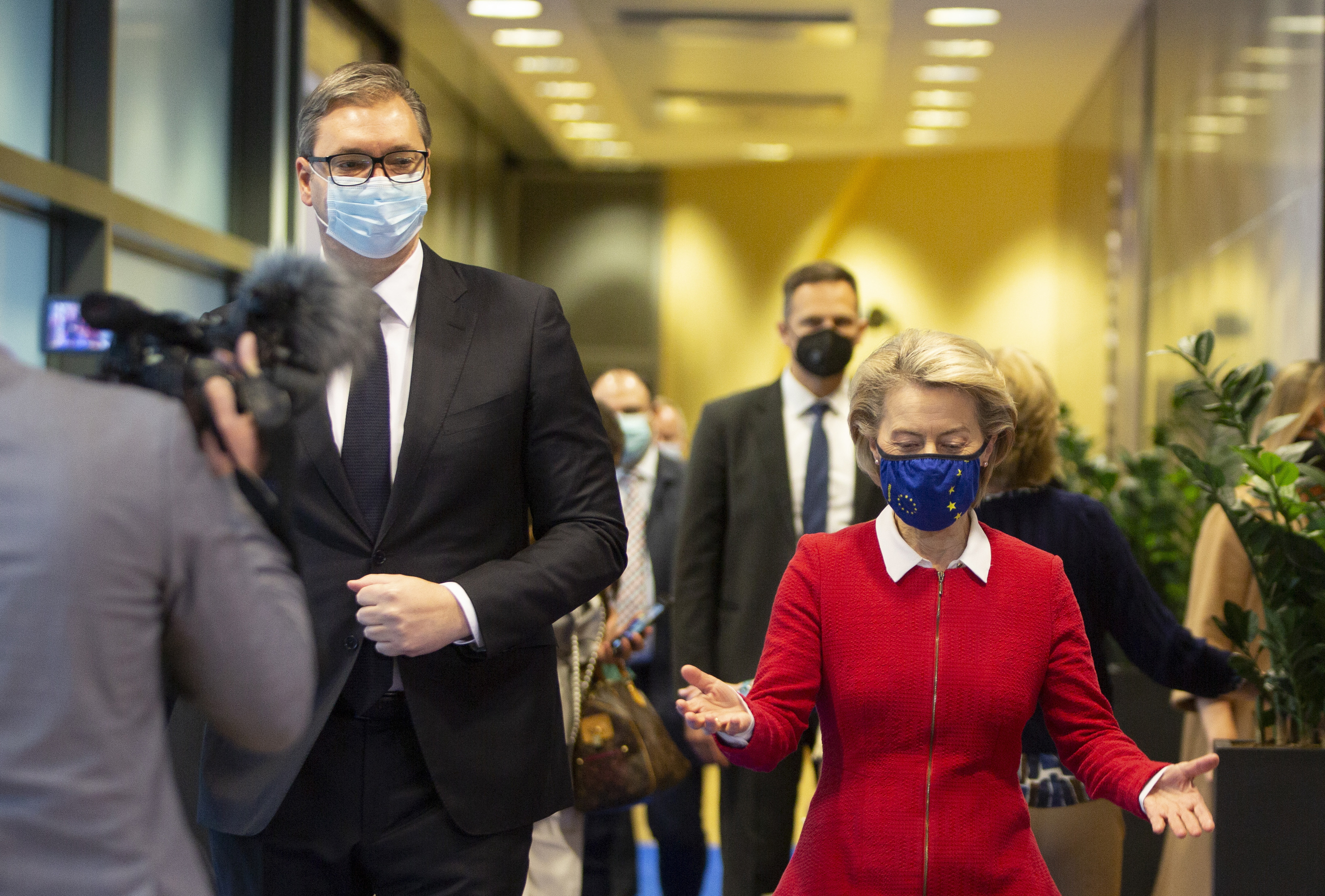 European Commission President Ursula von der Leyen, right, speaks with Serbian President Aleksandar Vucic, left, prior to a meeting at EU headquarters in Brussels, Monday, April 26, 2021. (AP Photo/Virginia Mayo, Pool)