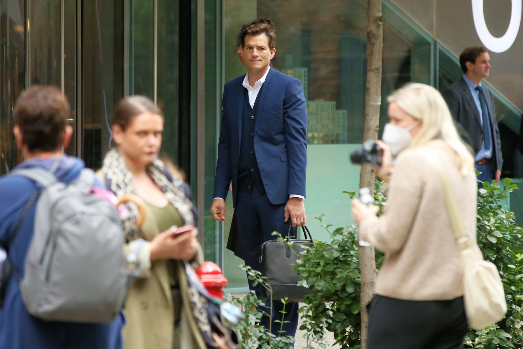 Ashton Kutcher looks sharp in a blue suit while filming 'Your Place or Mine' in Brooklyn