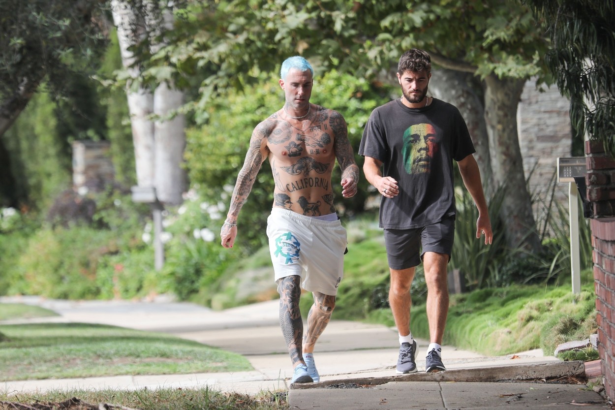 *EXCLUSIVE* Adam Levine shows off his new blue hair color and NEW tattoos covering his right leg!