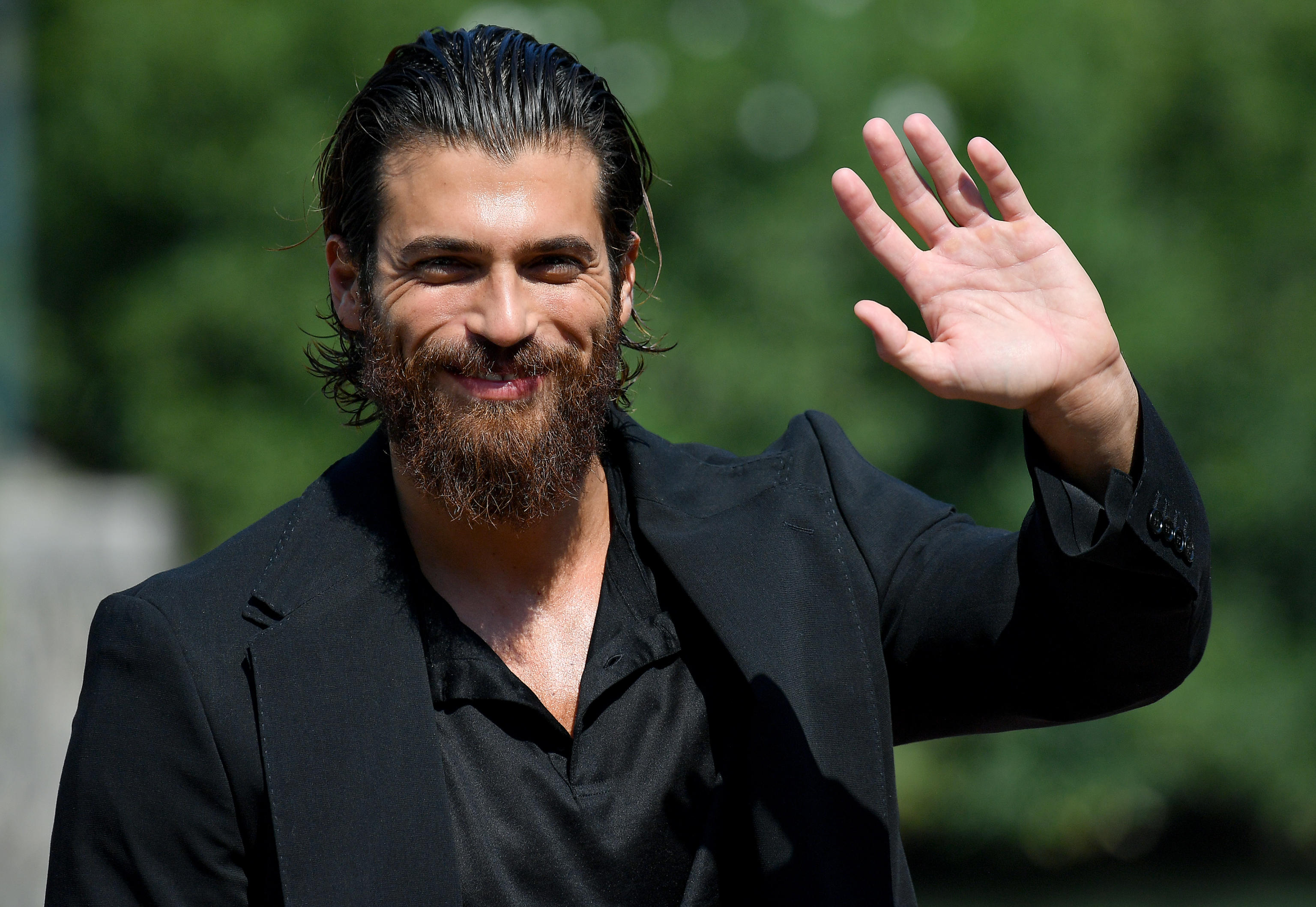epa09449110 Turkish actor Can Yaman arrives at the Lido Beach for the 78th annual Venice International Film Festival, in Venice, Italy, 05 September 2021. The festival runs from 01 to 11 September 2021.  EPA-EFE/ETTORE FERRARI