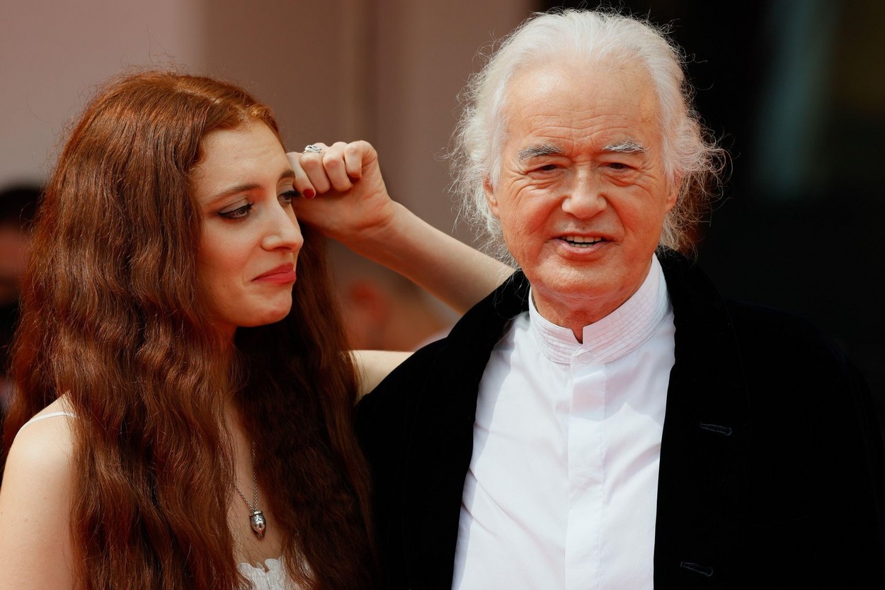 Venice, Italy. 04th Sep, 2021. Jimmy Page and his partner poet and performer Scarlett Sabet arrive for the screening of the film "Becoming Led Zeppelin" presented out of competition on September 4, 2021 during the 78th Venice Film Festival at Venice Lido.