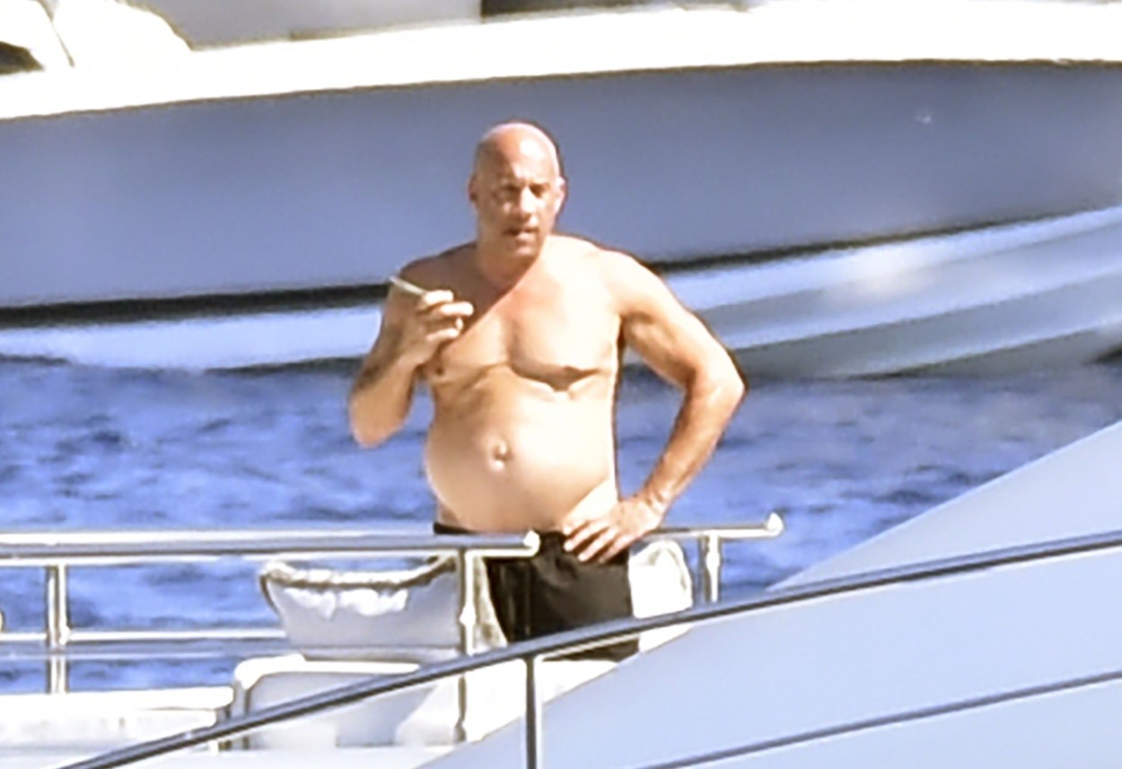*EXCLUSIVE* *WEB MUST CALL FOR PRICING* The American Actor Vin Diesel flaunts his belly as he goes shirtless while enjoying a family fun day in Portofino!