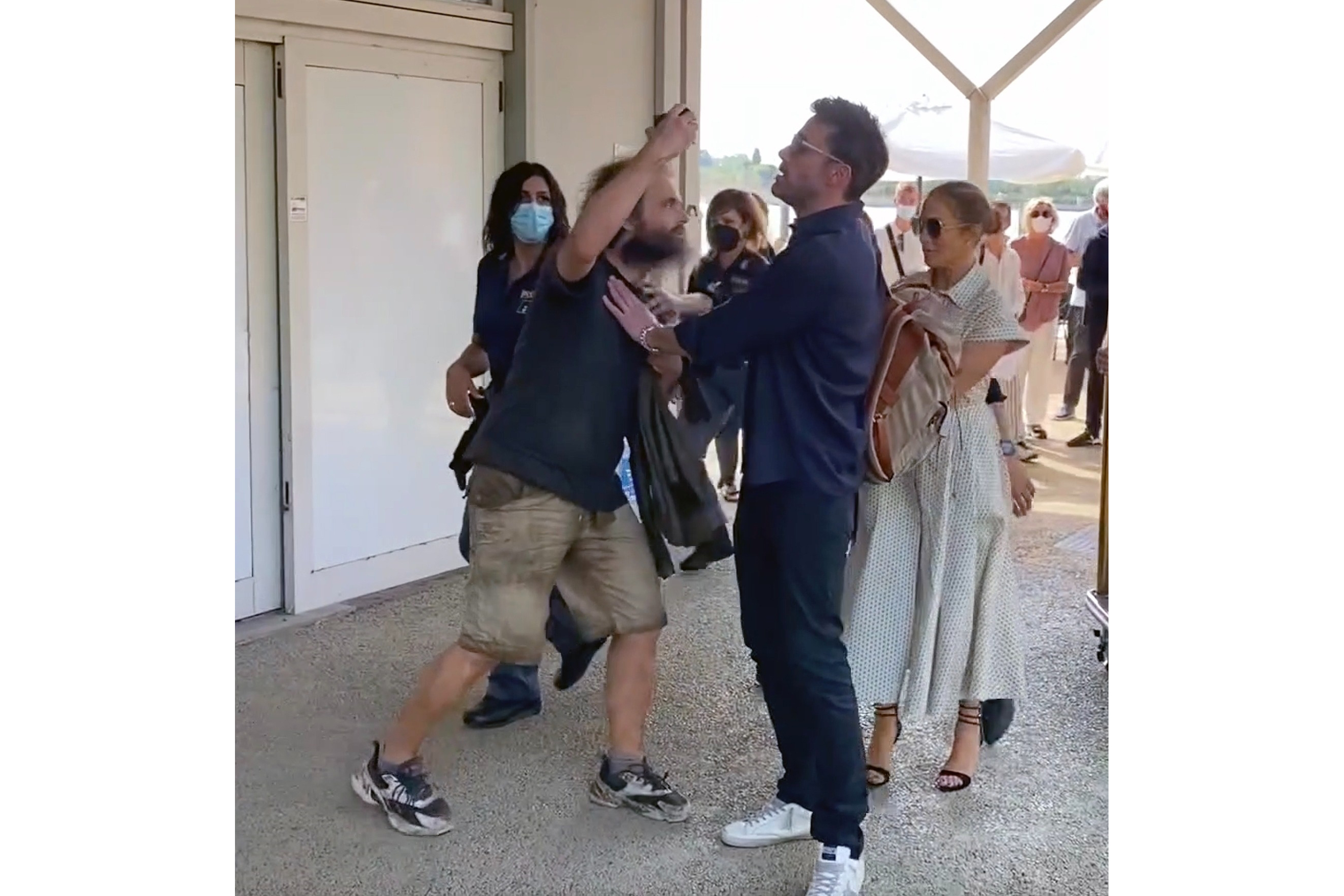 *PREMIUM-EXCLUSIVE* *NO MAIL ONLINE* *MUST CALL FOR PRICING* Ben Affleck pushes away a fan in Venice *Mailonline out*