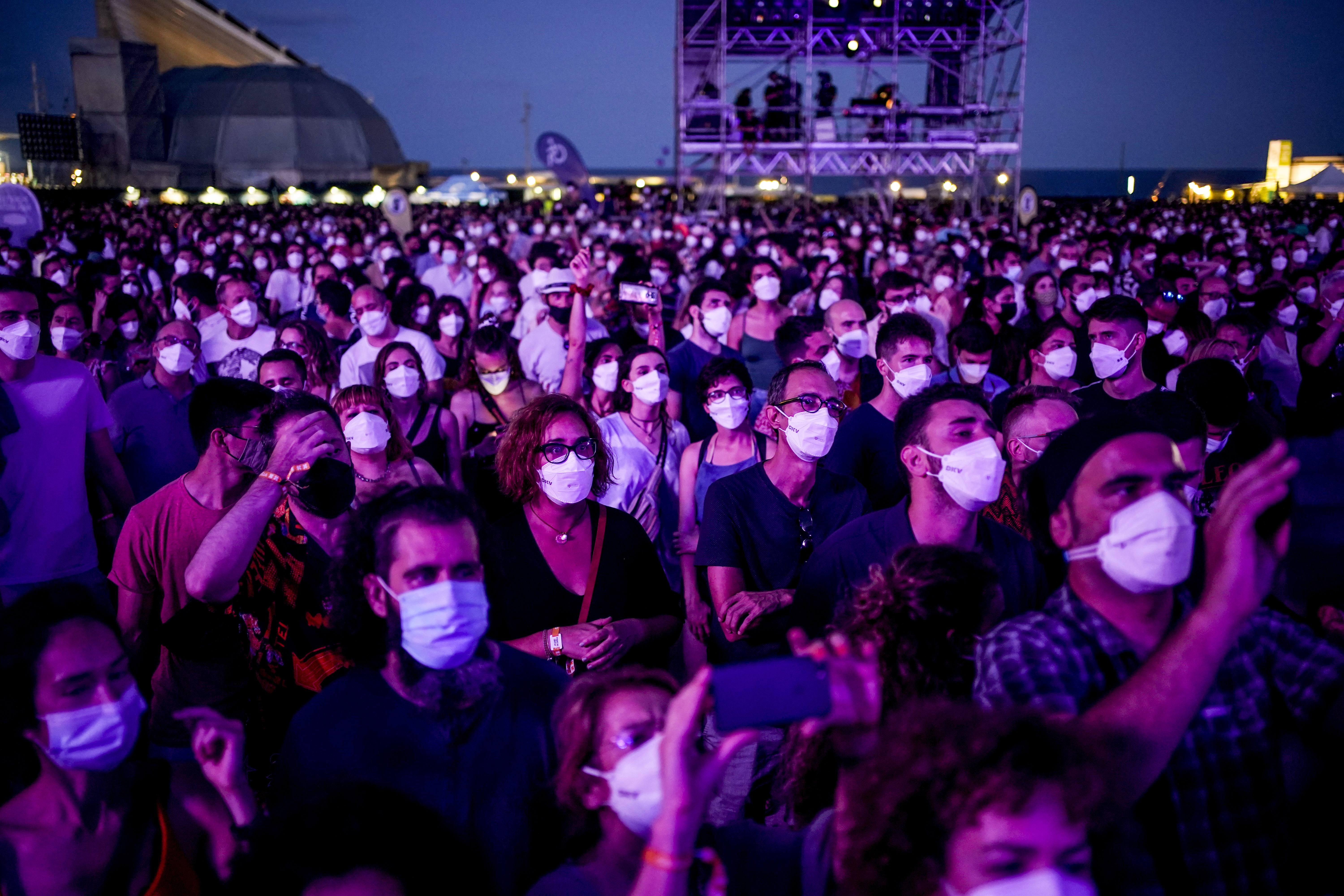 People attend the Cruilla music festival in Barcelona, Spain, Friday, July 9, 2021. (AP Photo/Joan Mateu)
