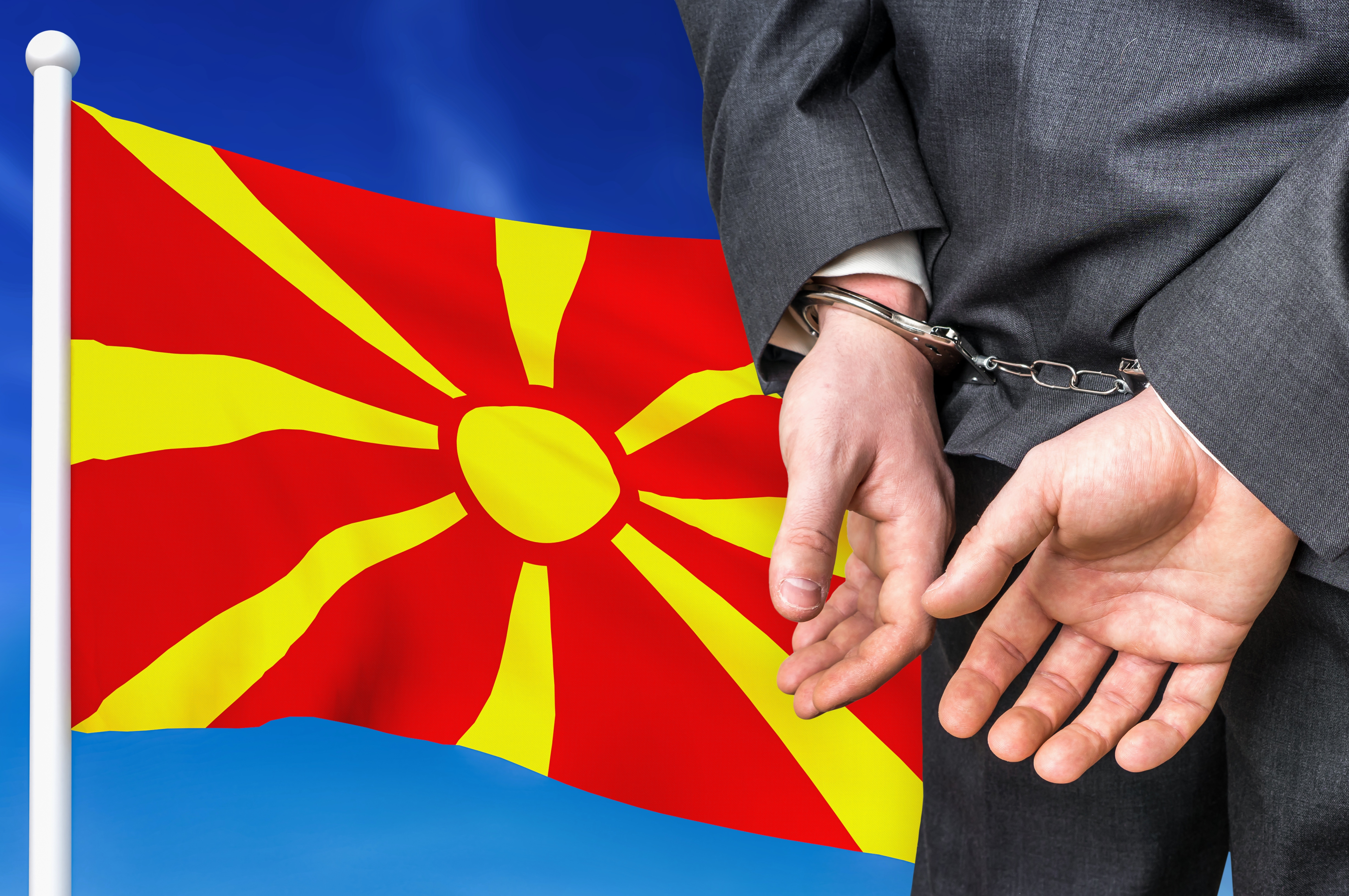 Prisons,And,Corruption,In,Macedonia.,Businessman,With,Handcuffs,On,National