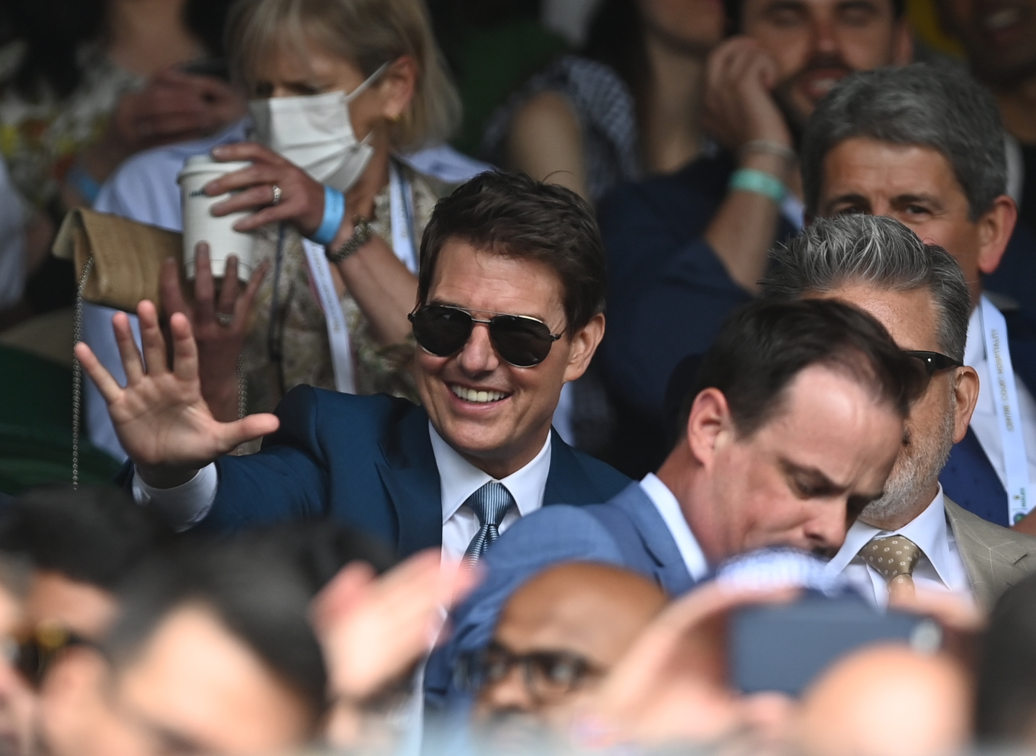 epa09337120 US actor Tom Cruise arrives for the Men's final match Novak Djokovic of Serbia against Matteo Berrettini of Italy at the Wimbledon Championships tennis tournament in Wimbledon, Britain 11 July 2021.  EPA-EFE/NEIL HALL   EDITORIAL USE ONLY