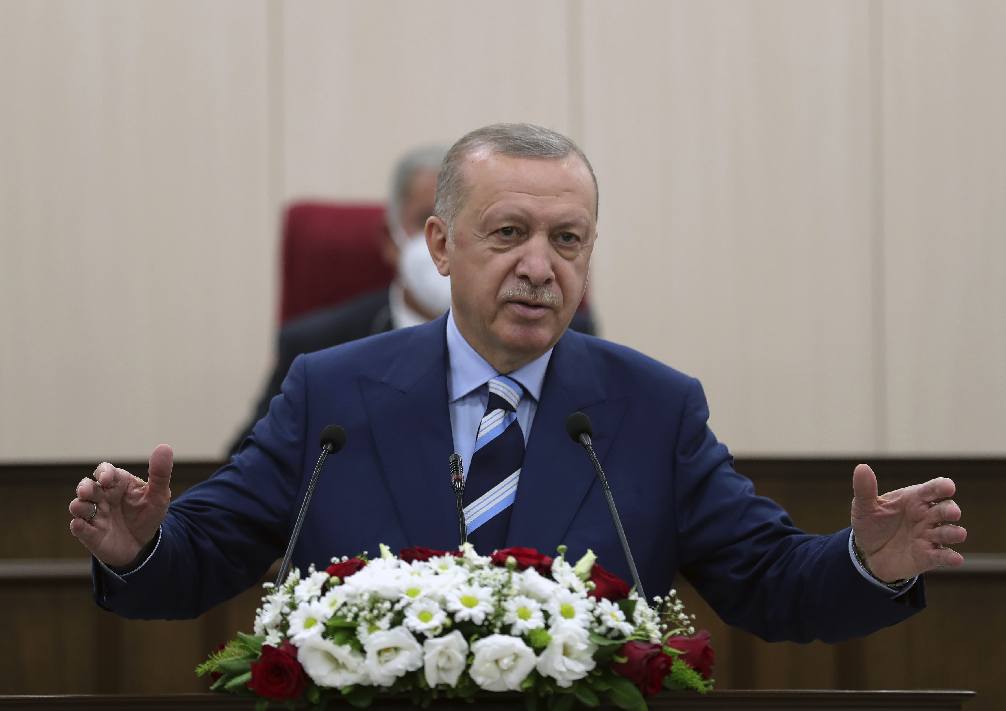 Turkey's President Recep Tayyip Erdogan addresses the Turkish Cypriot Parliament, in Nicosia, Cyprus, Monday, July 19, 2021. Erdogan is in the Turkish northern breakaway part of Cyprus for a two-day visit.(Turkish Presidency via AP, Pool)