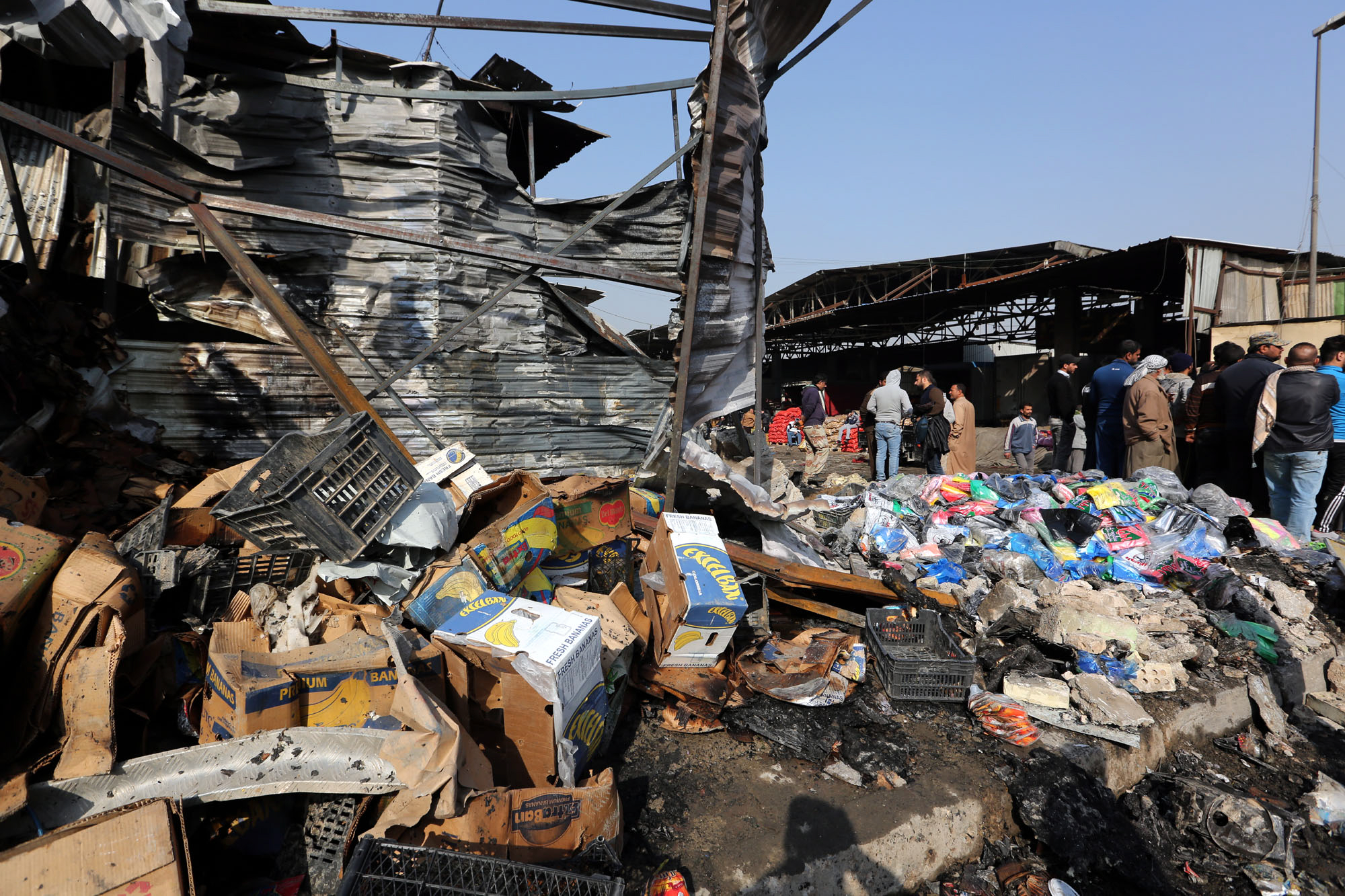 Eksplozija Irak, At least 12 people dead after car bomb attack on market in Sadr City