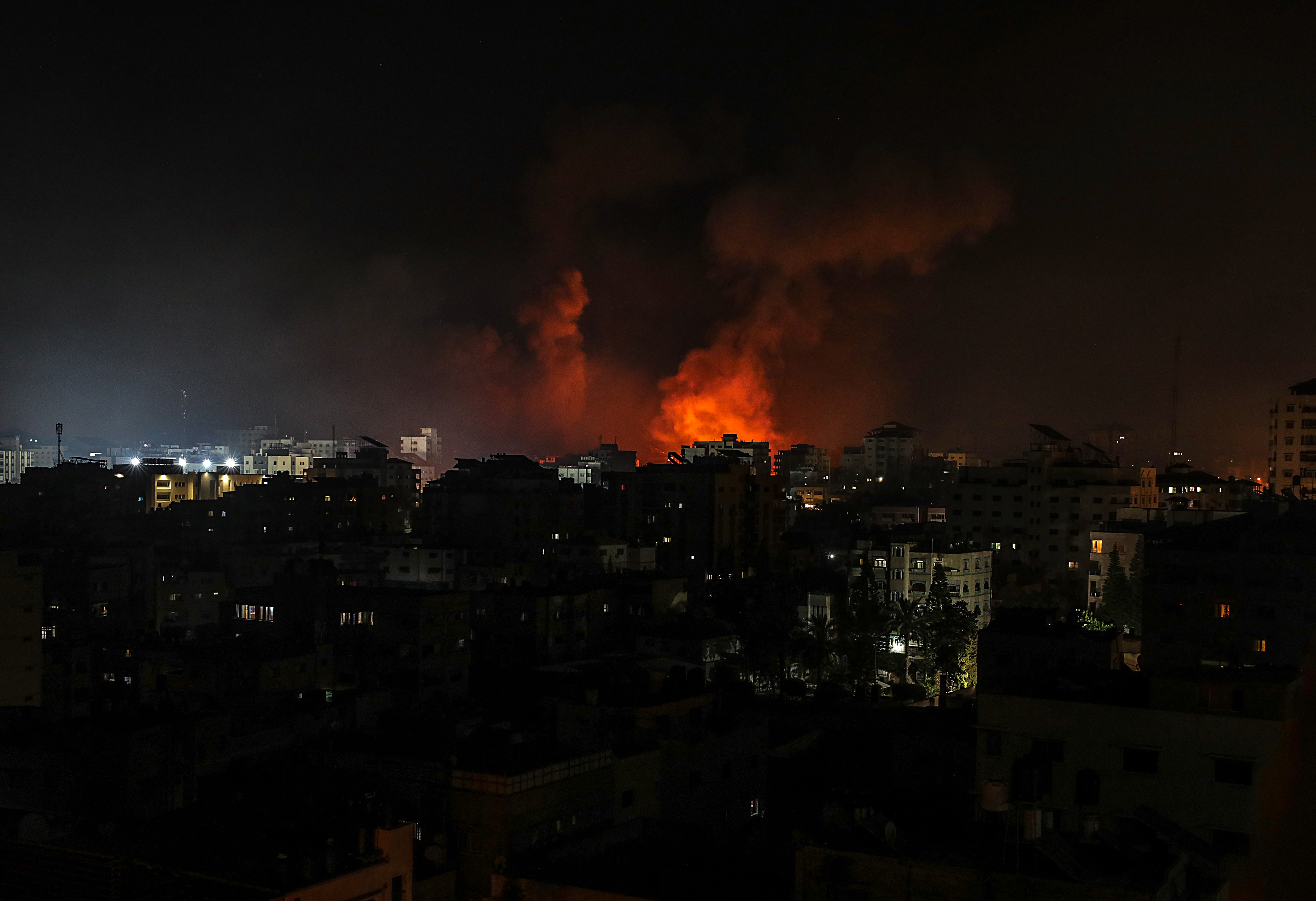 Smoke rise after an Israeli air strike in Gaza City