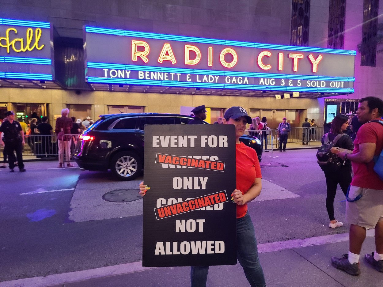 Protest as vaccines are made mandatory in NYC as Lady Gaga and Tony Bennett concert guests arrive that is only open to the fully vaxed