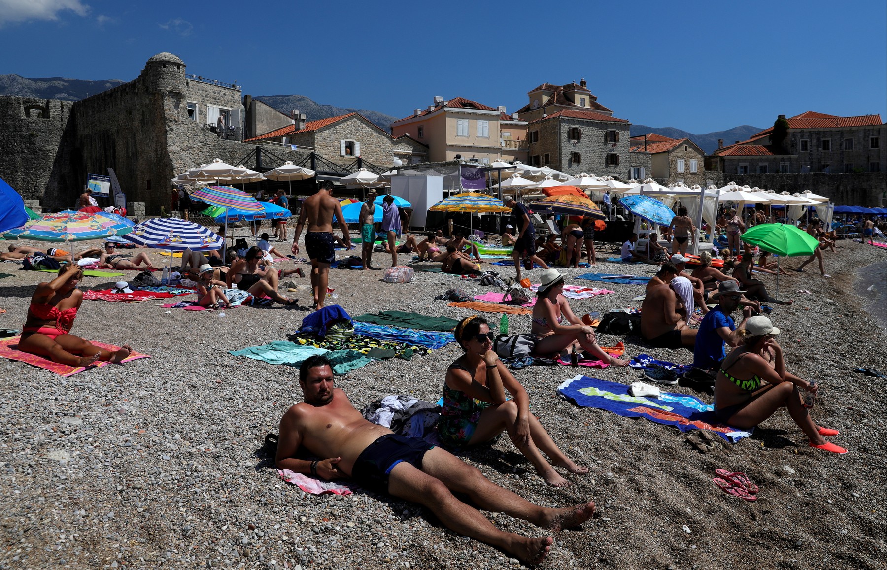 MONTENEGRO - AUGUST 18, 2019: People on a beach in Budva, Montenegro, on the Adriatic Sea coast. Valery Sharifulin/TASS,Image: 466902331, License: Rights-managed, Restrictions: , Model Release: no, Credit line: Valery Sharifulin / TASS / Profimedia