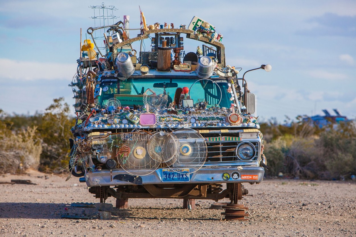 An old pickup truck is decorated as a piece of folk art in the settlement of Slab City in the Mojave Desert.