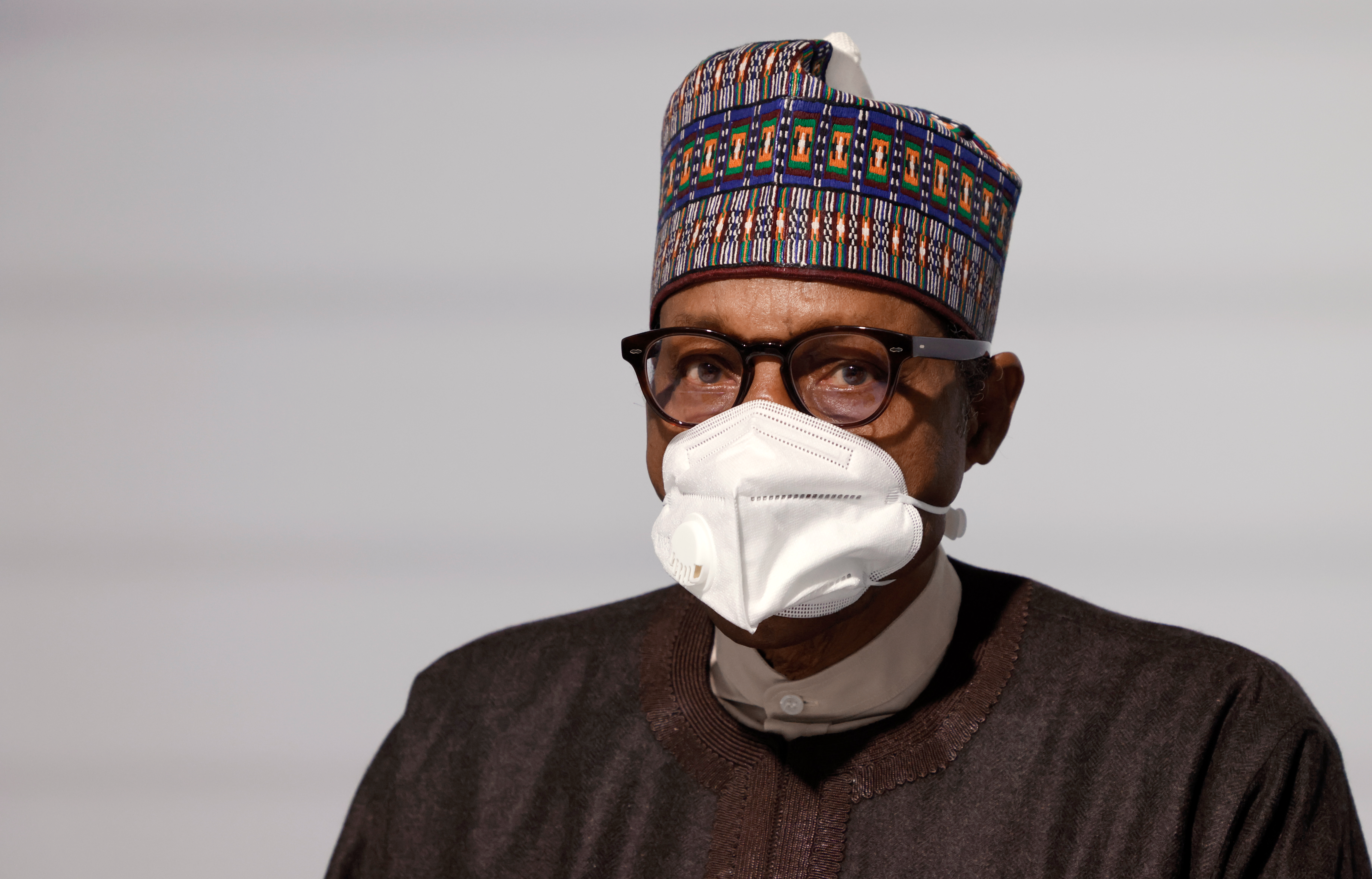 epa09208735 Nigeria's President Muhammadu Buhari poses before the opening session of the Summit on the Financing of African Economies in Paris, France, 18 May 2021.  EPA-EFE/LUDOVIC MARIN / POOL  MAXPPP OUT