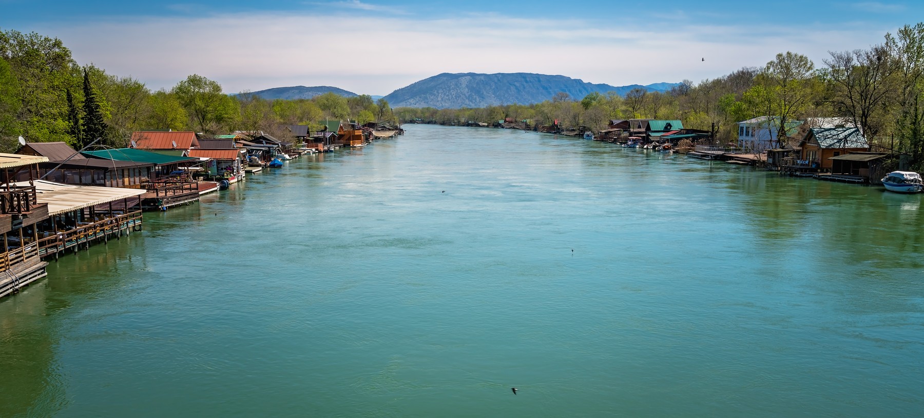 Small wooden houses and restaurants on the riverbank of the Ada Bojana river near Ulcinj,  Montenegro,Image: 381090707, License: Royalty-free, Restrictions: , Model Release: no, Credit line: Pawel Opaska / Panthermedia / Profimedia