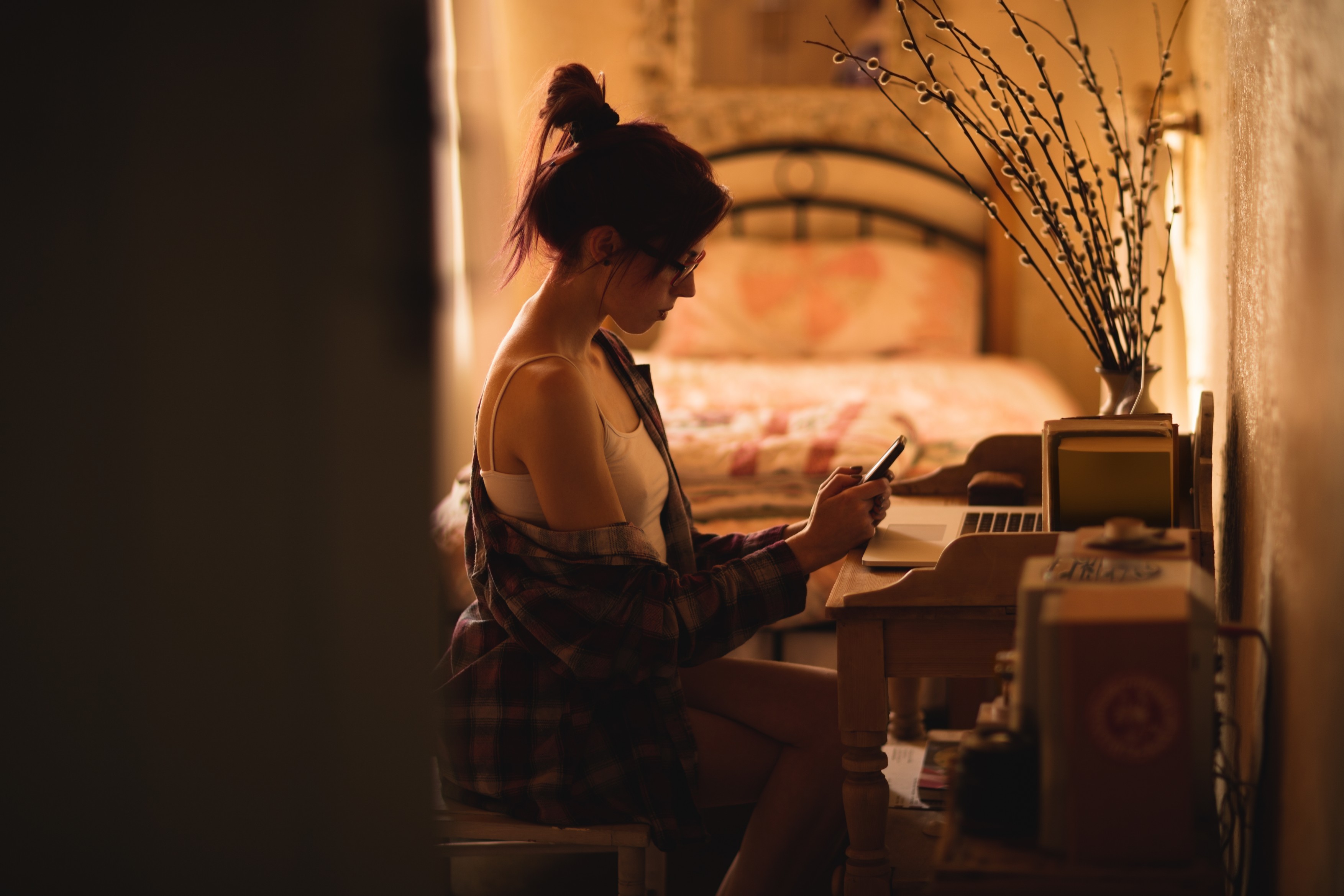 Young woman text messaging on mobile phone