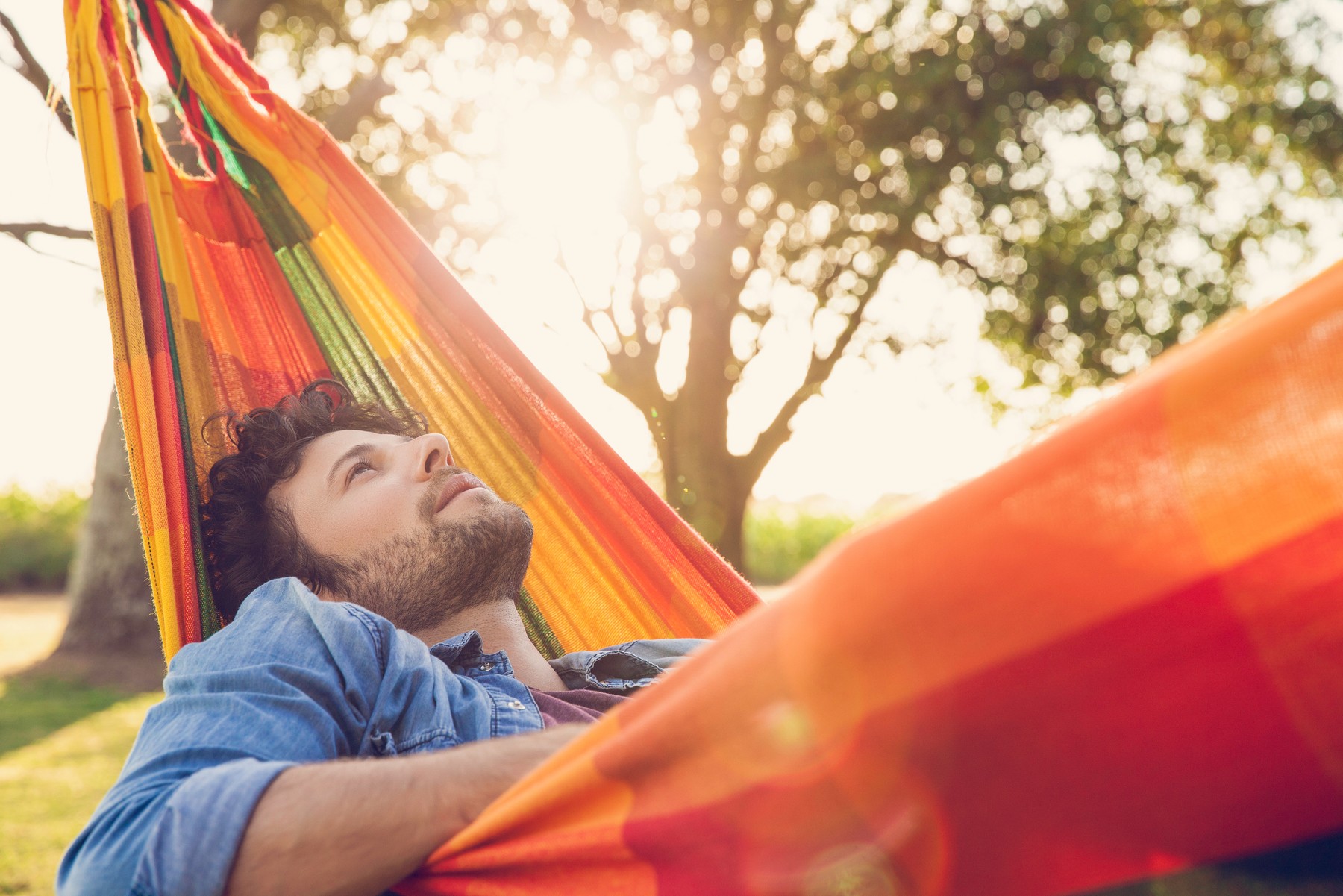Man relaxing in hammock,Image: 298615942, License: Royalty-free, Restrictions: , Model Release: yes, Credit line: - / PhotoAlto / Profimedia