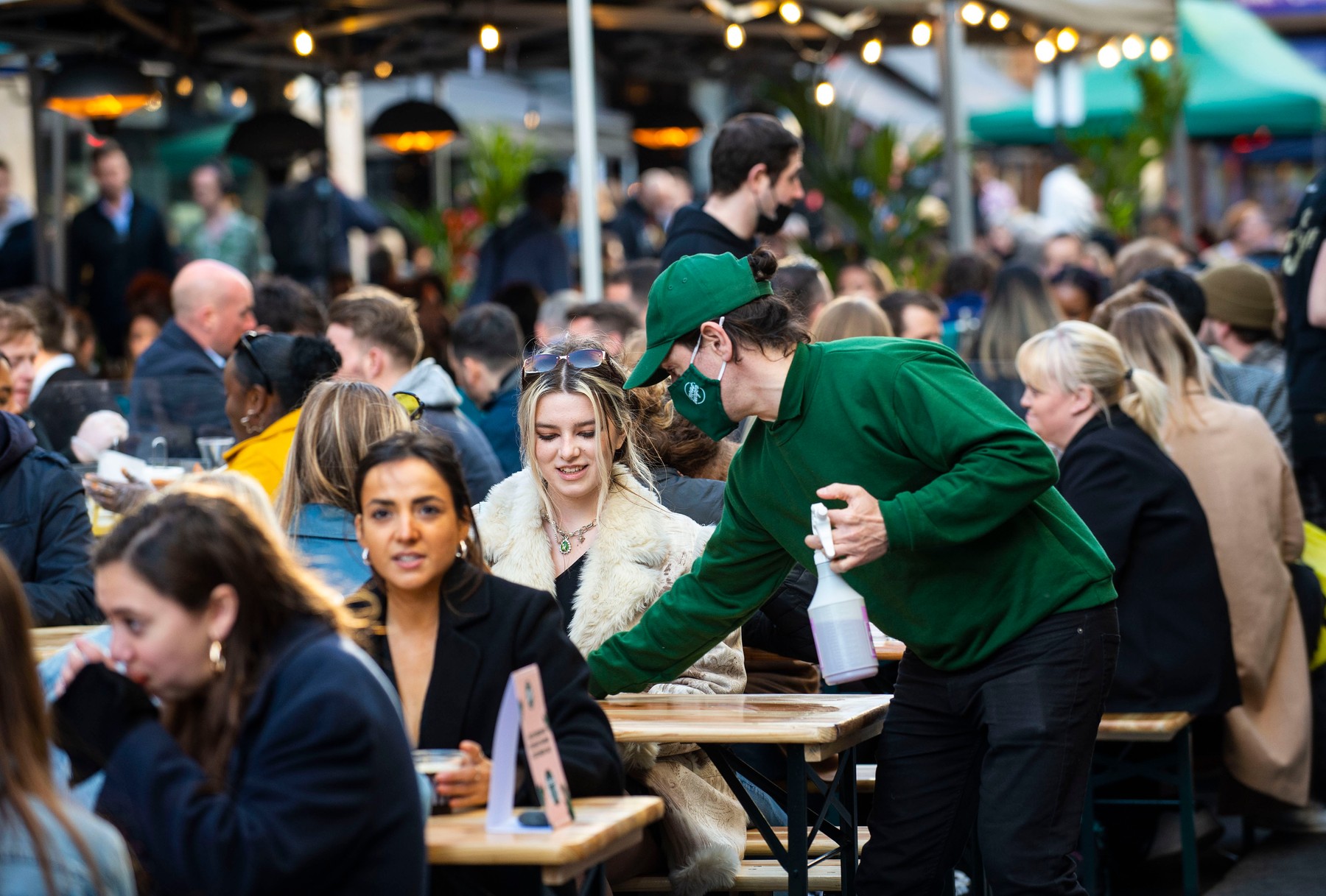 Crowds surge back to London’s West End as lockdown curbs are lifted