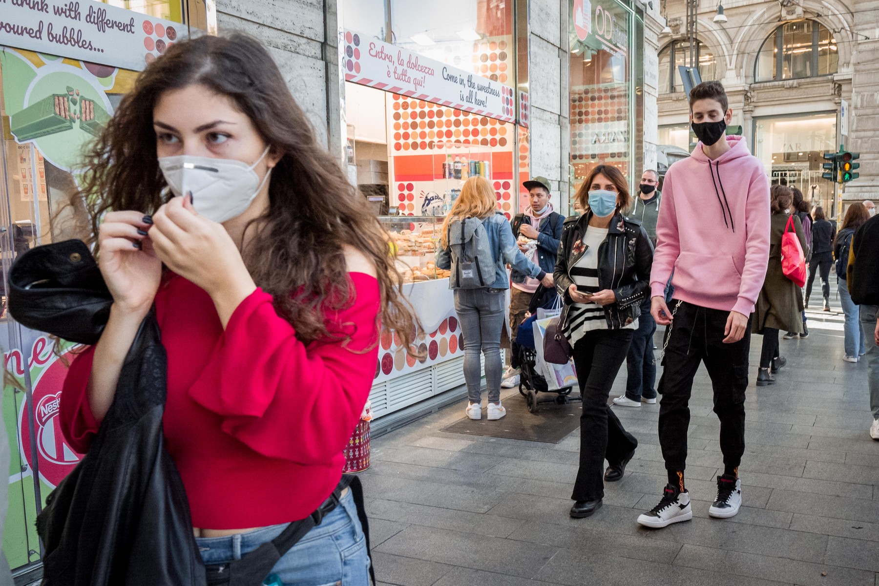 People with masks in the streets of the new center are required to wear COVID-19 emergency face masks