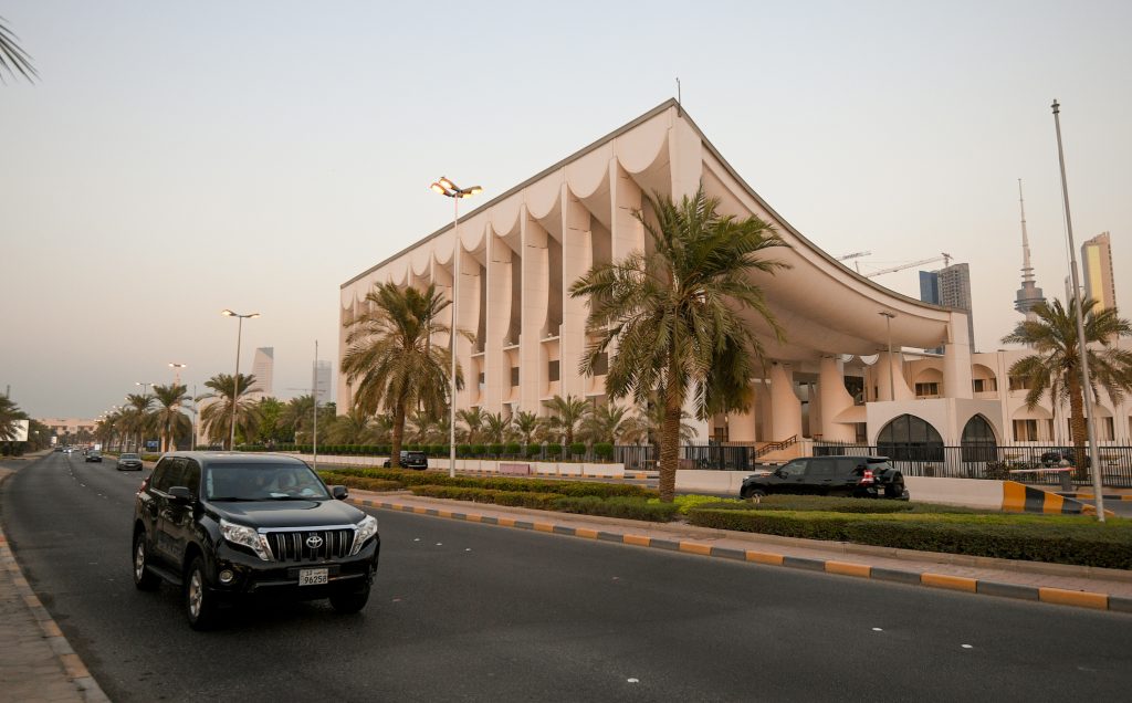 epa08706202 Car drive in front of Nation Assembly in Kuwait City, Kuwait, 29 September 2020. According to state media, Emir of Kuwait, Sheikh Sabah Al-Ahmad Al-Jaber Al-Sabah has died at the age of 91 on 29 September 2020.  EPA-EFE/NOUFAL IBRAHIM