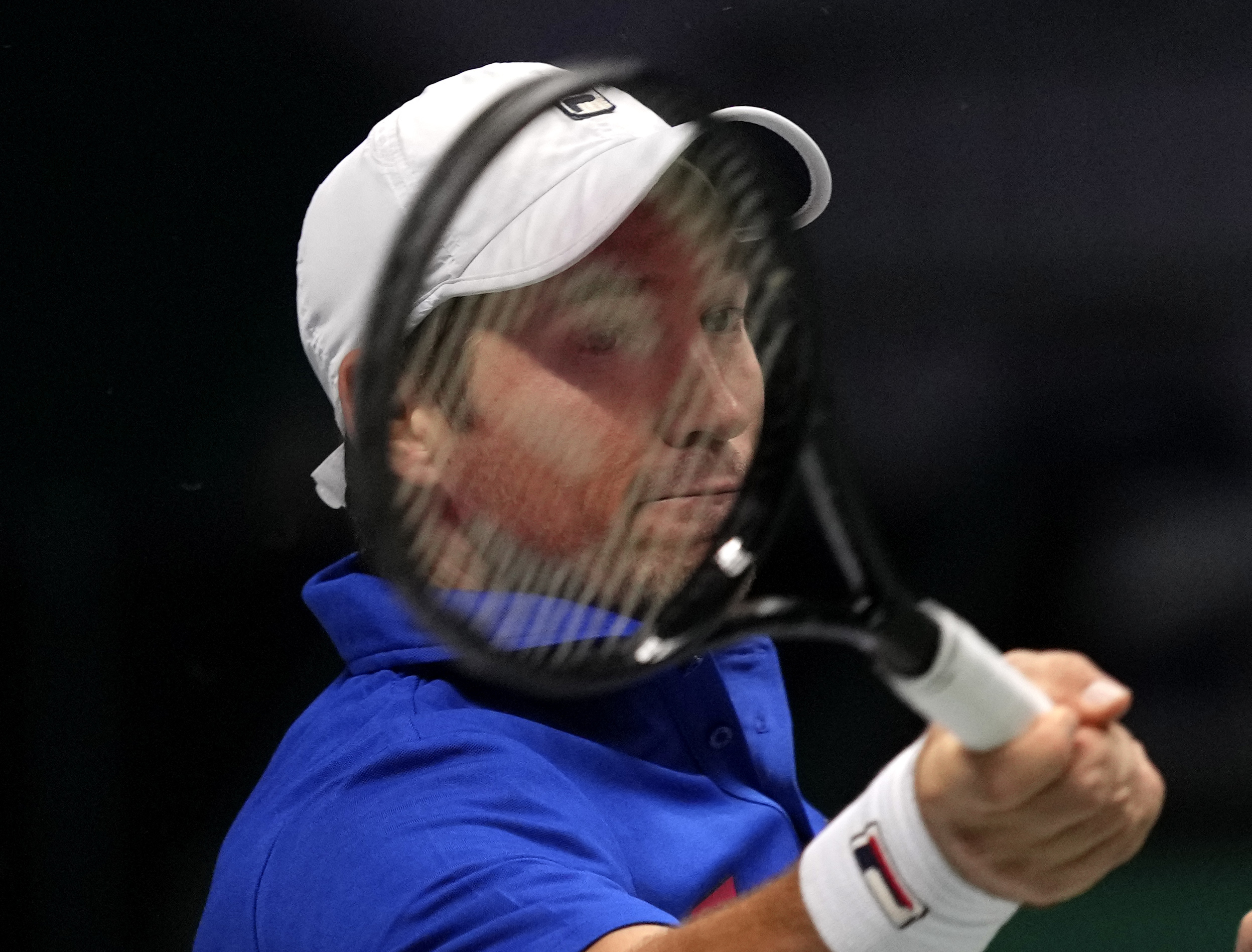 Serbia's Dusan Lajovic hits a forehand against Austria's Gerald Melzer during a Davis Cup group F match between Serbia and Austria in Innsbruck, Austria, Friday, Nov. 26, 2021. (Photo/Michael Probst)