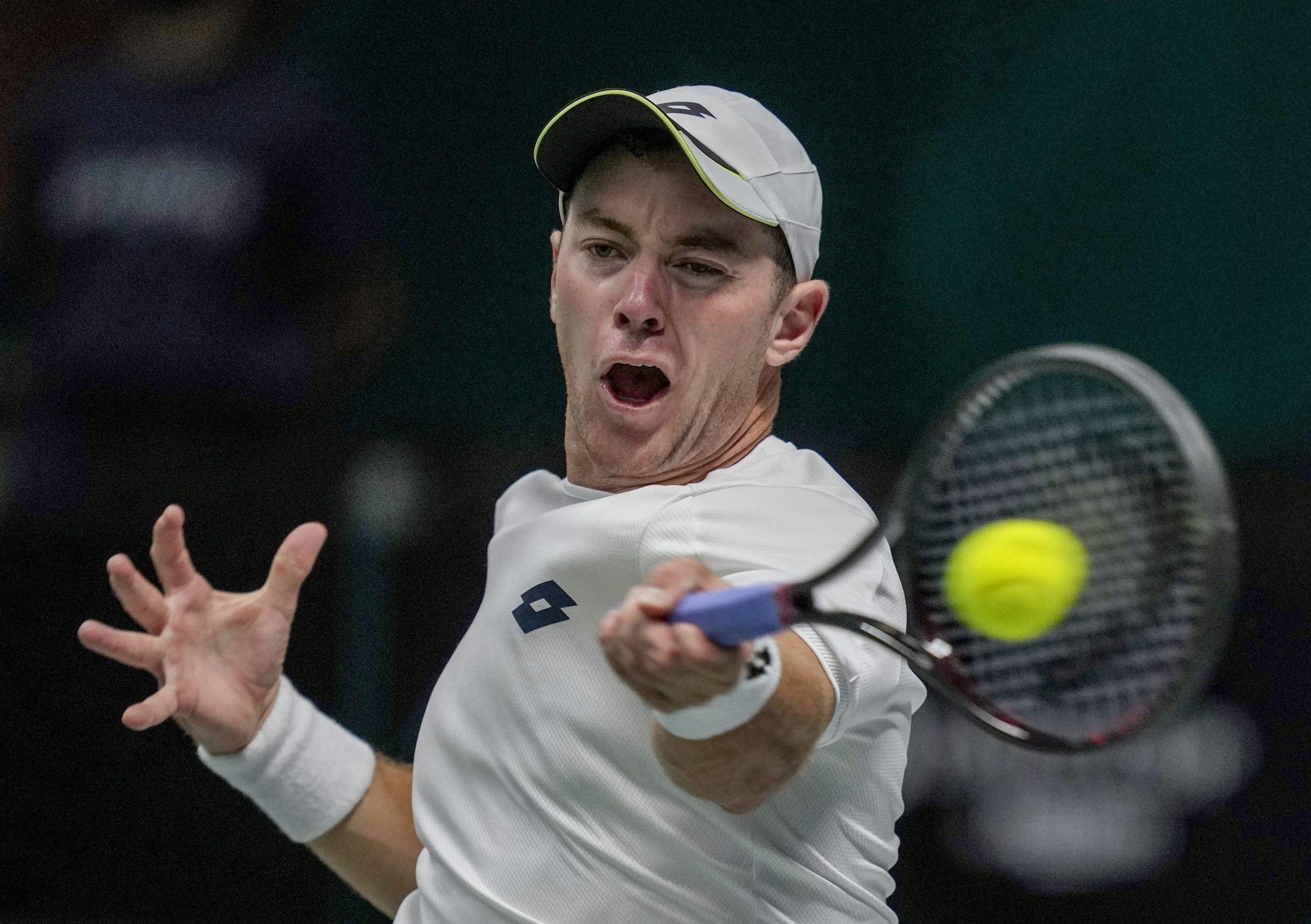 Germany's Dominik Koepfer hits a forehand against Serbia's Filip Krajinovic during a Davis Cup group F match between Serbia and Germany in Innsbruck, Austria, Saturday, Nov. 27, 2021. (Photo/Michael Probst)