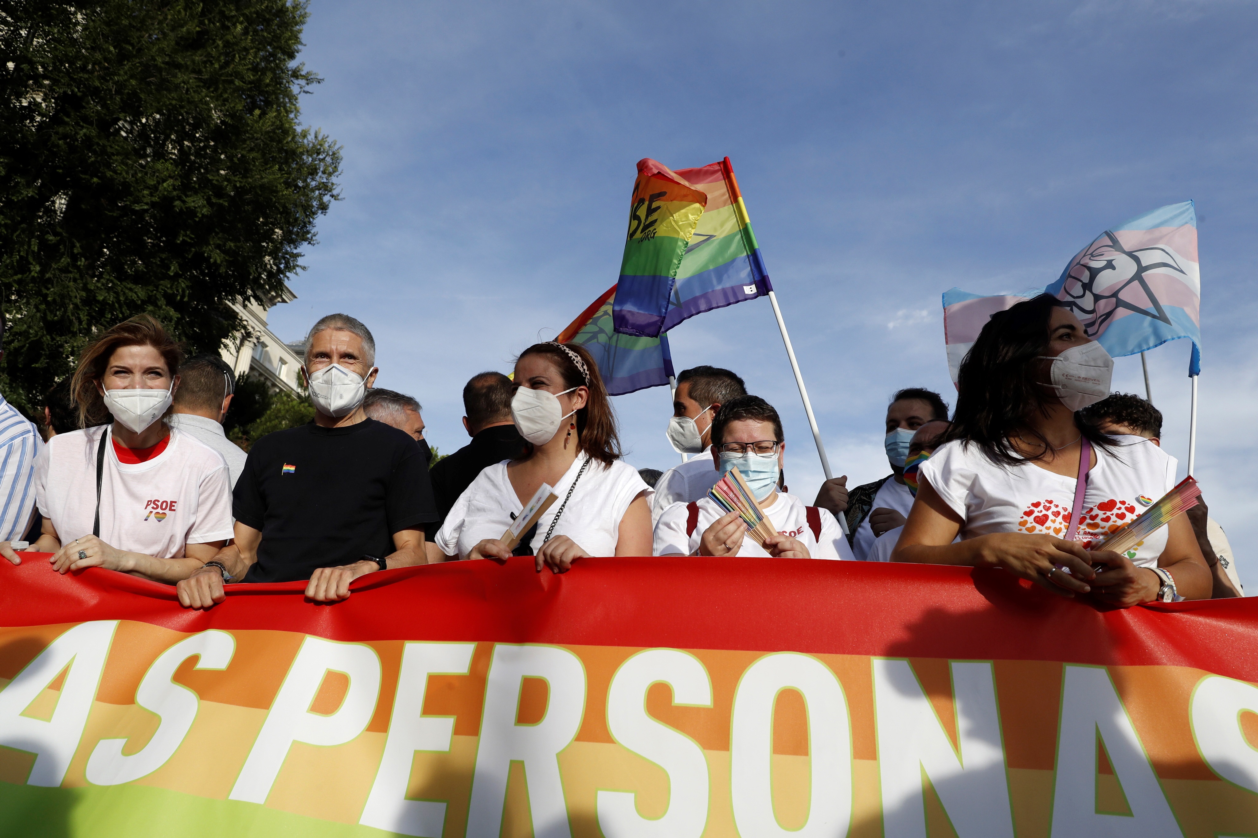 epa09321104 Spanish Home Affairs Minister, Fernando Grande-Marlaska (2-L), attends the LGBTI Pride march in Madrid, Spain, 03 July 2021.  EPA-EFE/GANDUL