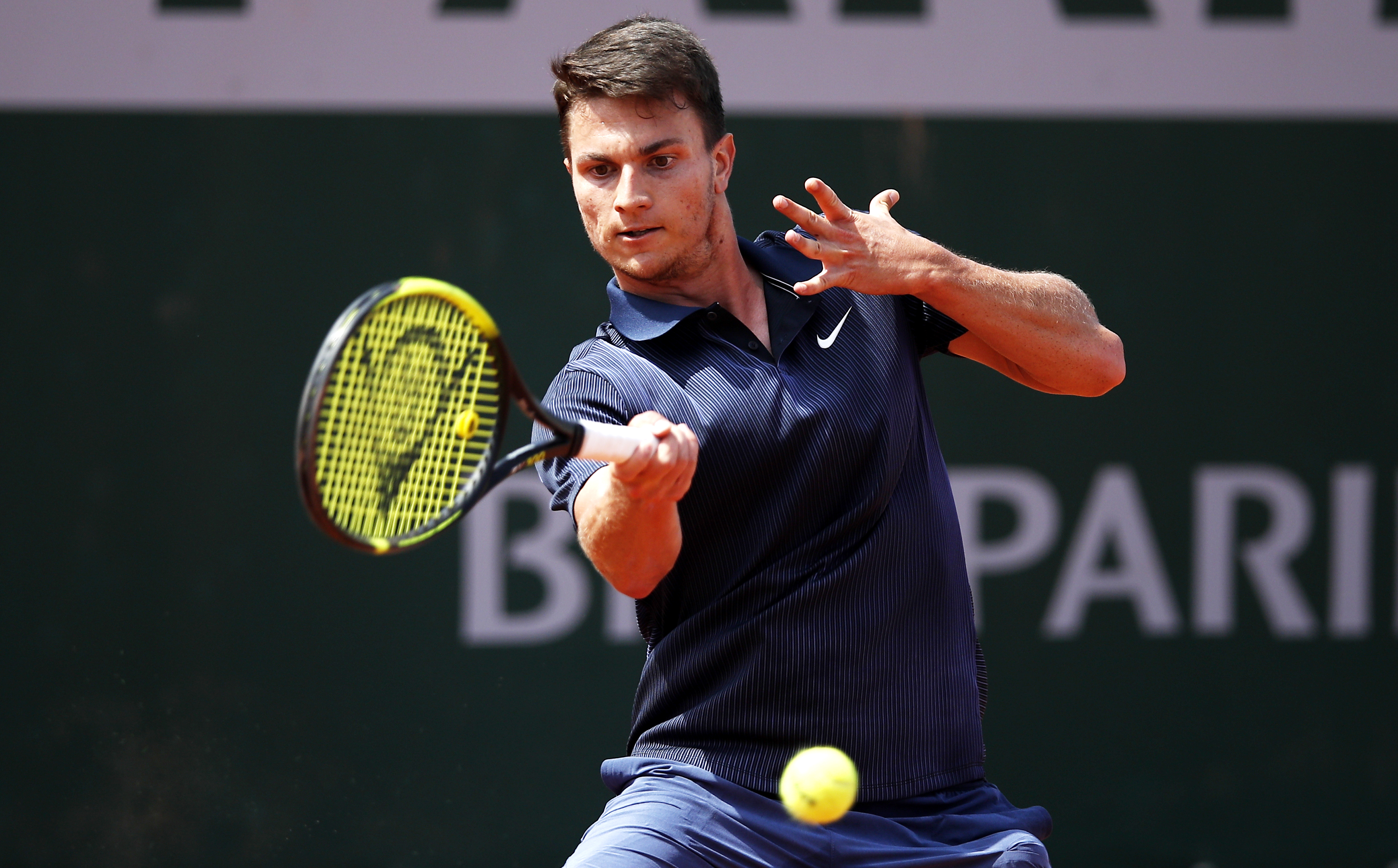 epa09242553 Miomir Kecmanovic of Serbia hits a forehand during the 2nd round match against Laslo Djere of Serbia at the French Open tennis tournament at Roland Garros in Paris, France, 02 June 2021.  EPA-EFE/YOAN VALAT