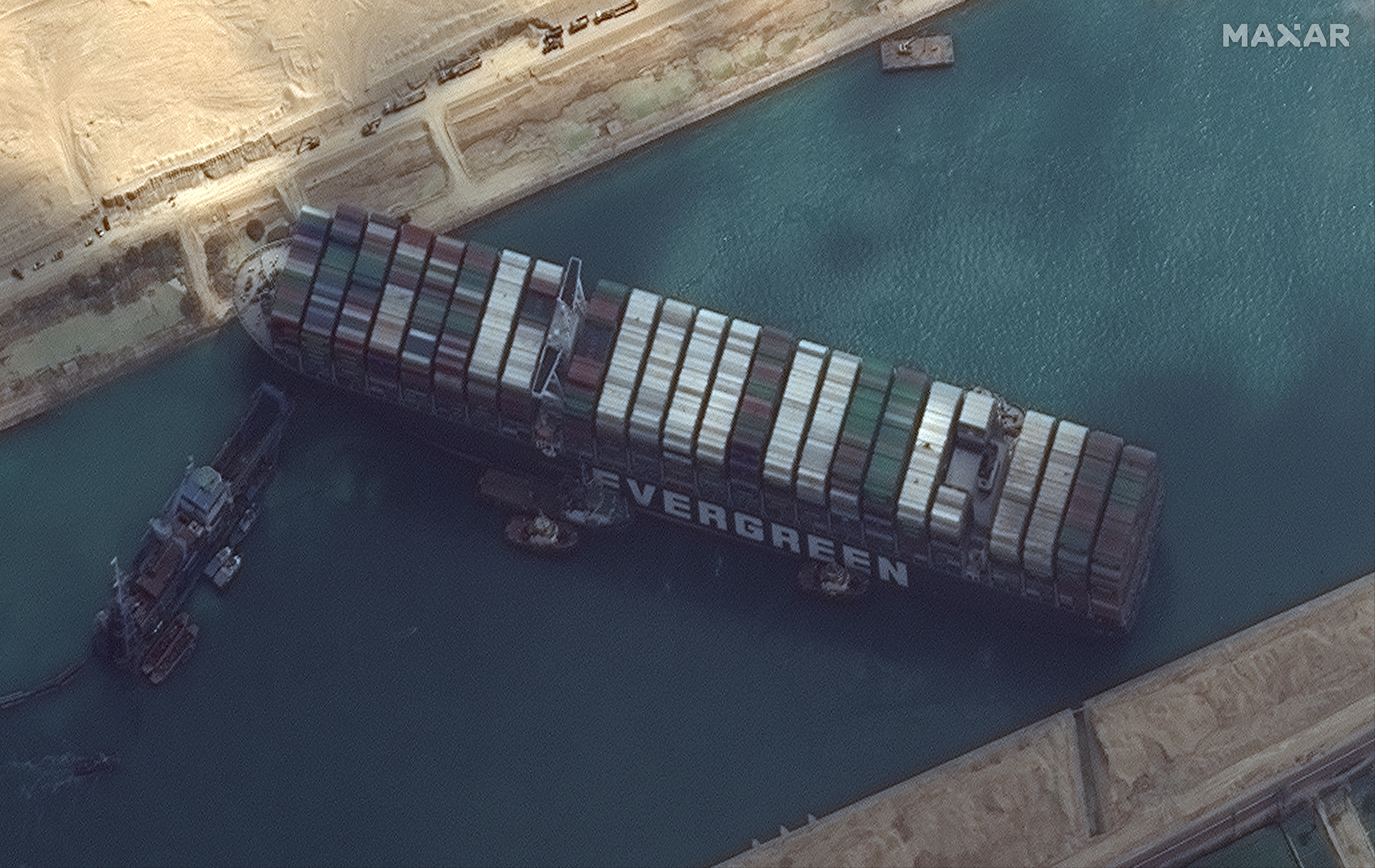 Suez Canal blocked as container ship runs aground