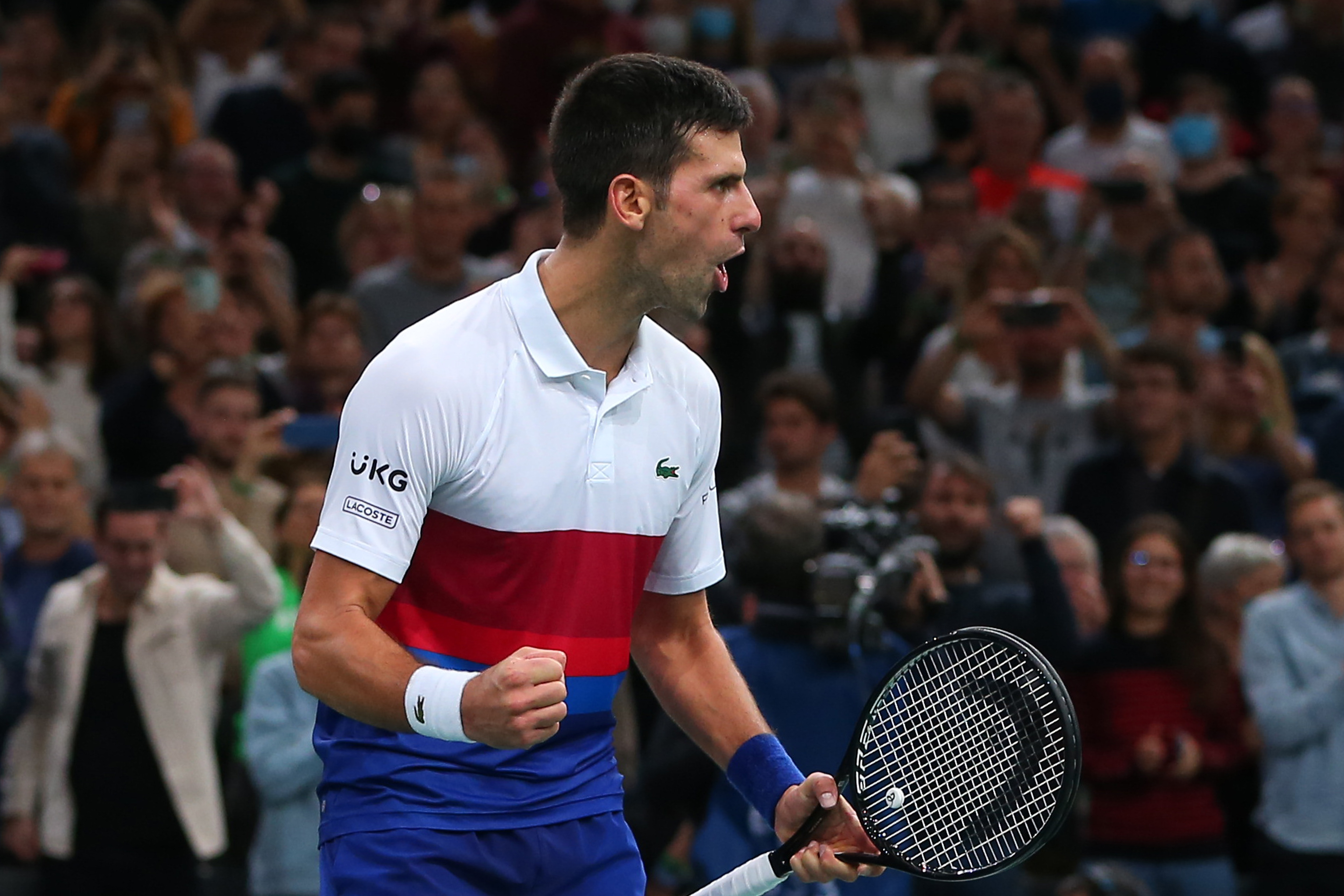 epa09568043 Novak Djokovic of Serbia reacts after winning his semi final match against Hubert Hurkacz of Poland at the Rolex Paris Masters tennis tournament in Paris, France, 06 November 2021.  EPA-EFE/CHRISTOPHE PETIT TESSON