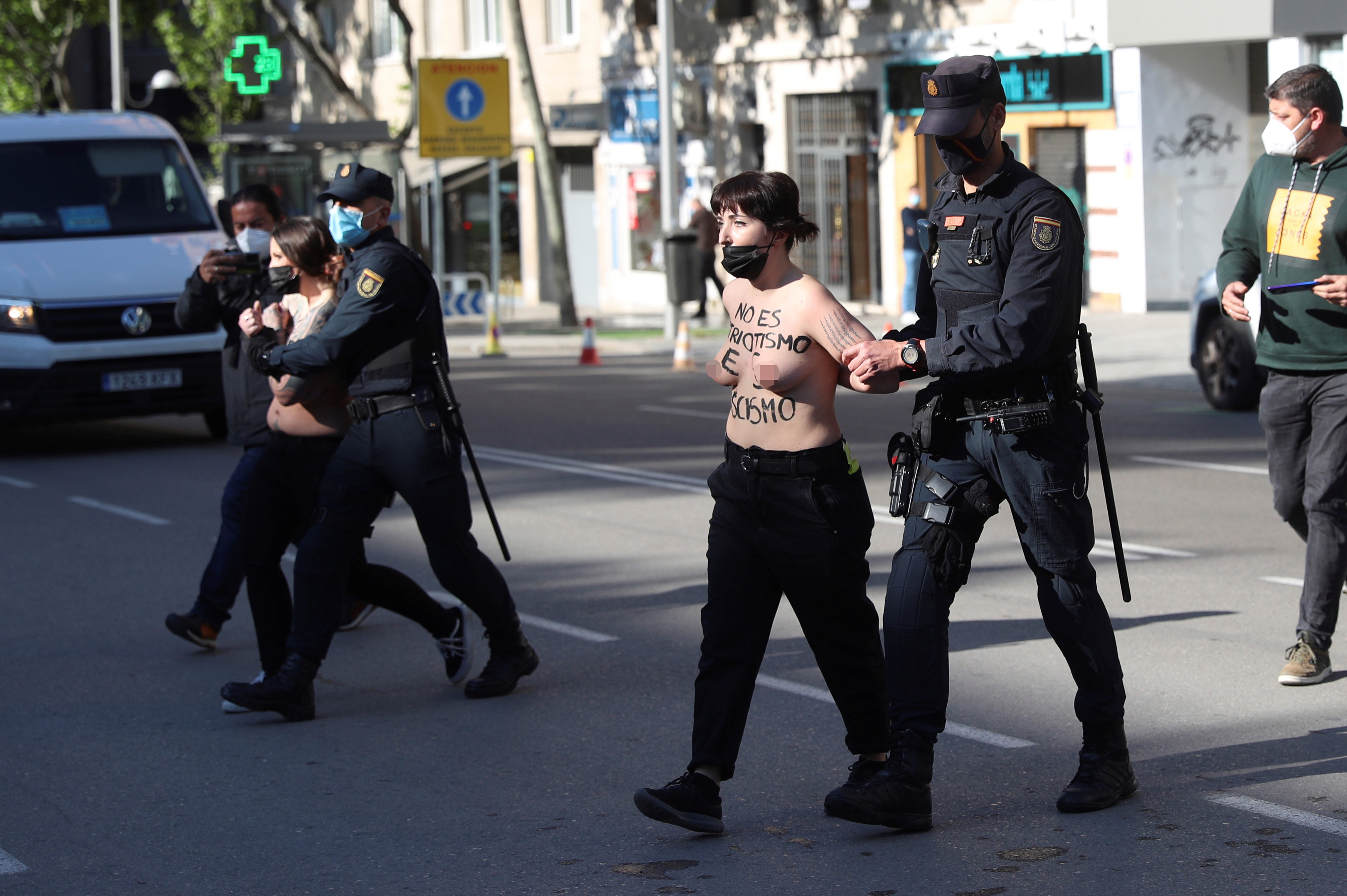 FEMEN activists protest during regional elections in Madrid
