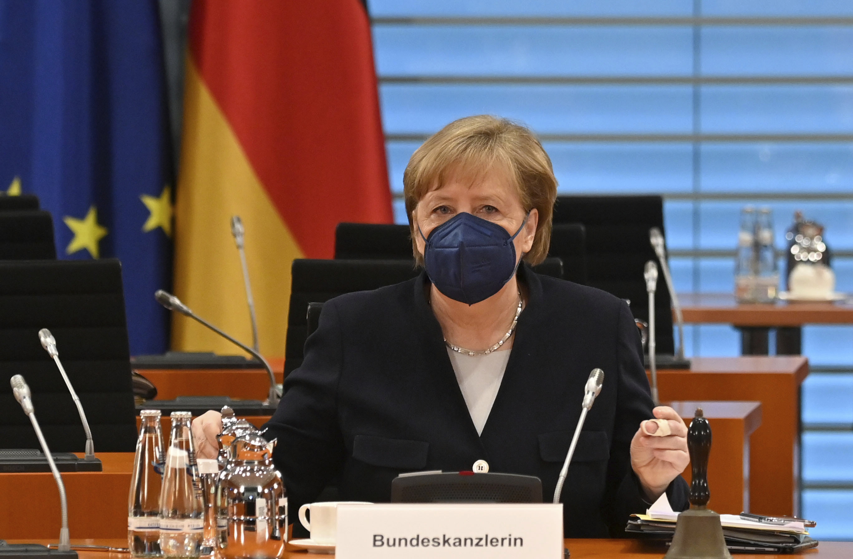 German Chancellor Angela Merkel arrives for the weekly cabinet meeting at the Chancellery in Berlin, Germany, Wednesday, May 5, 2021. (John MacDougall/Pool Photo via AP)