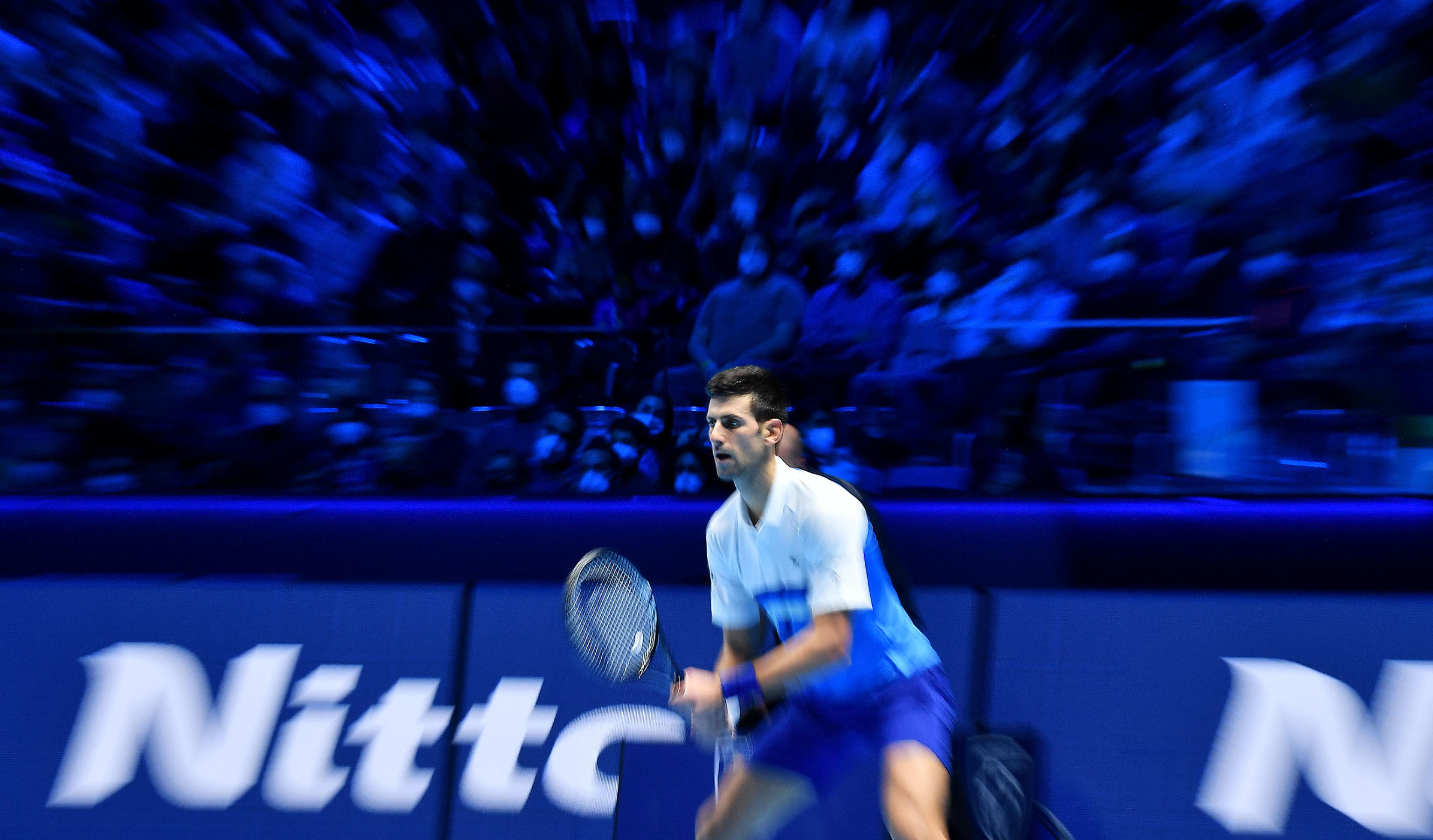 epa09594904 Novak Djokovic of Serbia in action against Alexander Zverev of Germany during their semi final match of the Nitto ATP Finals tennis tournament in Turin, Italy, 20 November 2021.  EPA-EFE/Alessandro Di Marco