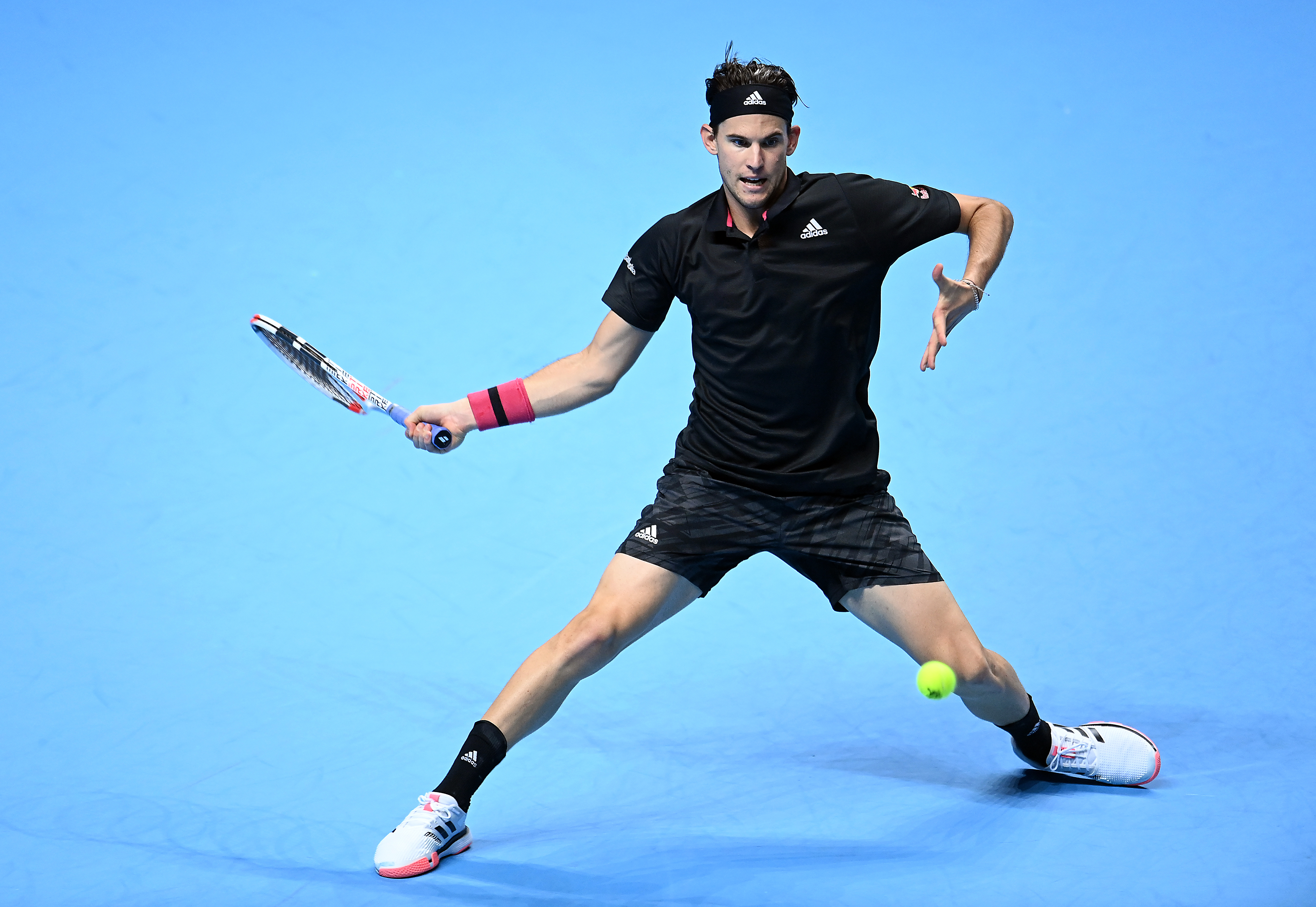 epa08829306 Austria's Dominic Thiem in action during his group stage match against Russia's Andrey Rublev during at the ATP Finals in London, Britain, 19 November 2020.  EPA-EFE/ANDY RAIN