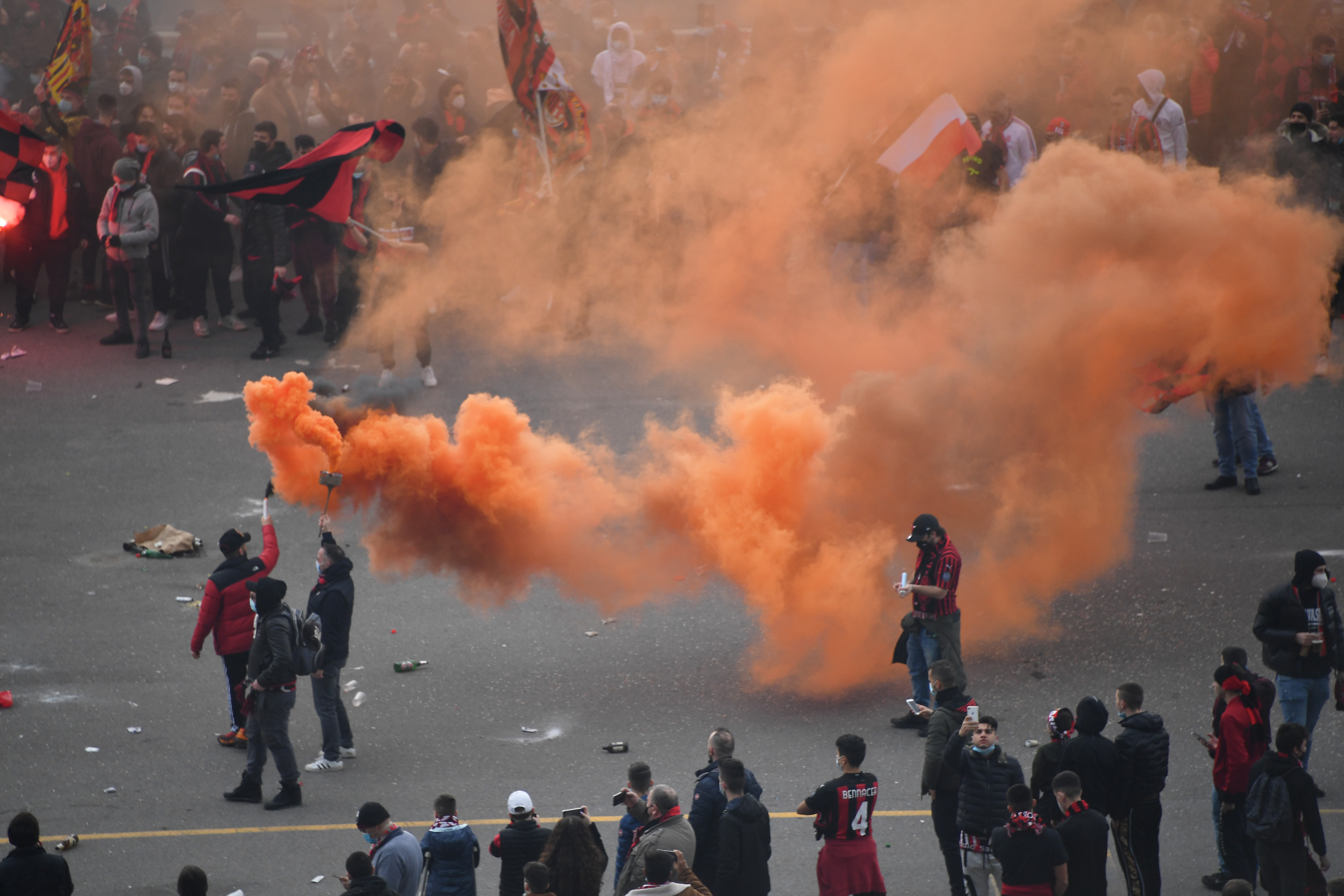 21022021 Soccer Football - Serie A - AC Milan v Inter Milan - San Siro, Milan, Italy - February 21, 2021 General view of fans letting off smoke bombs outside the stadium before the match REUTERS/Daniele Mascolo