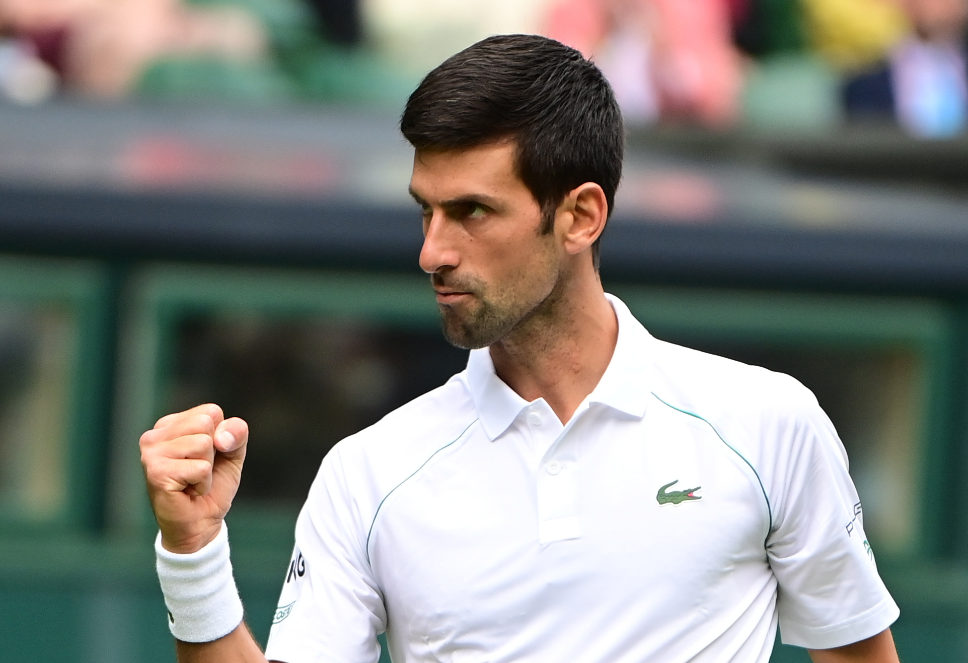 epa09313256 Novak Djokovic of Serbia reacts during the 2nd round match against Kevin Anderson of South Africa at the Wimbledon Championships, Wimbledon, Britain 30 June 2021.  EPA-EFE/NEIL HALL   EDITORIAL USE ONLY  EDITORIAL USE ONLY  EDITORIAL USE ONLY