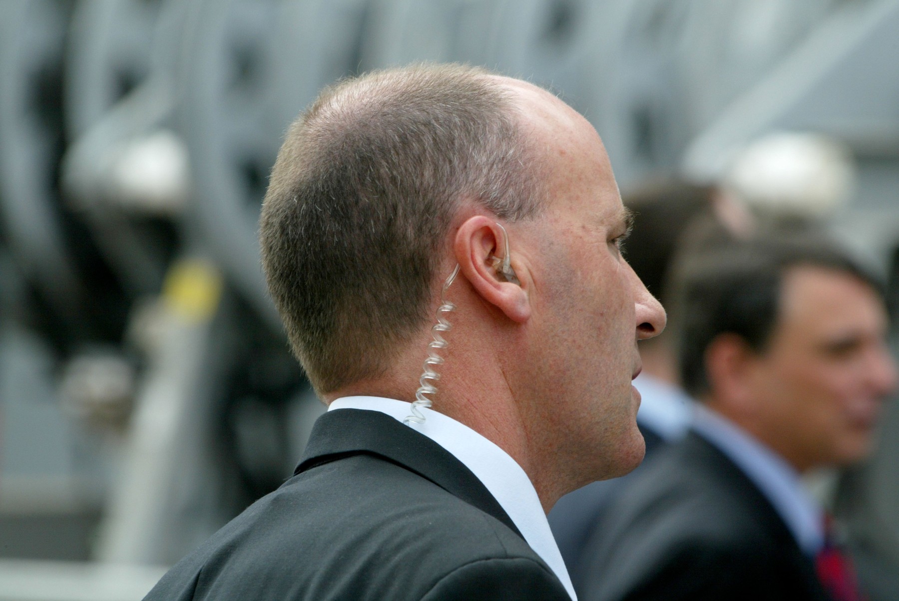 A security man with network listening device in ear,Image: 4313866, License: Rights-managed, Restrictions: , Model Release: no, Credit line: david hancock / Alamy / Profimedia