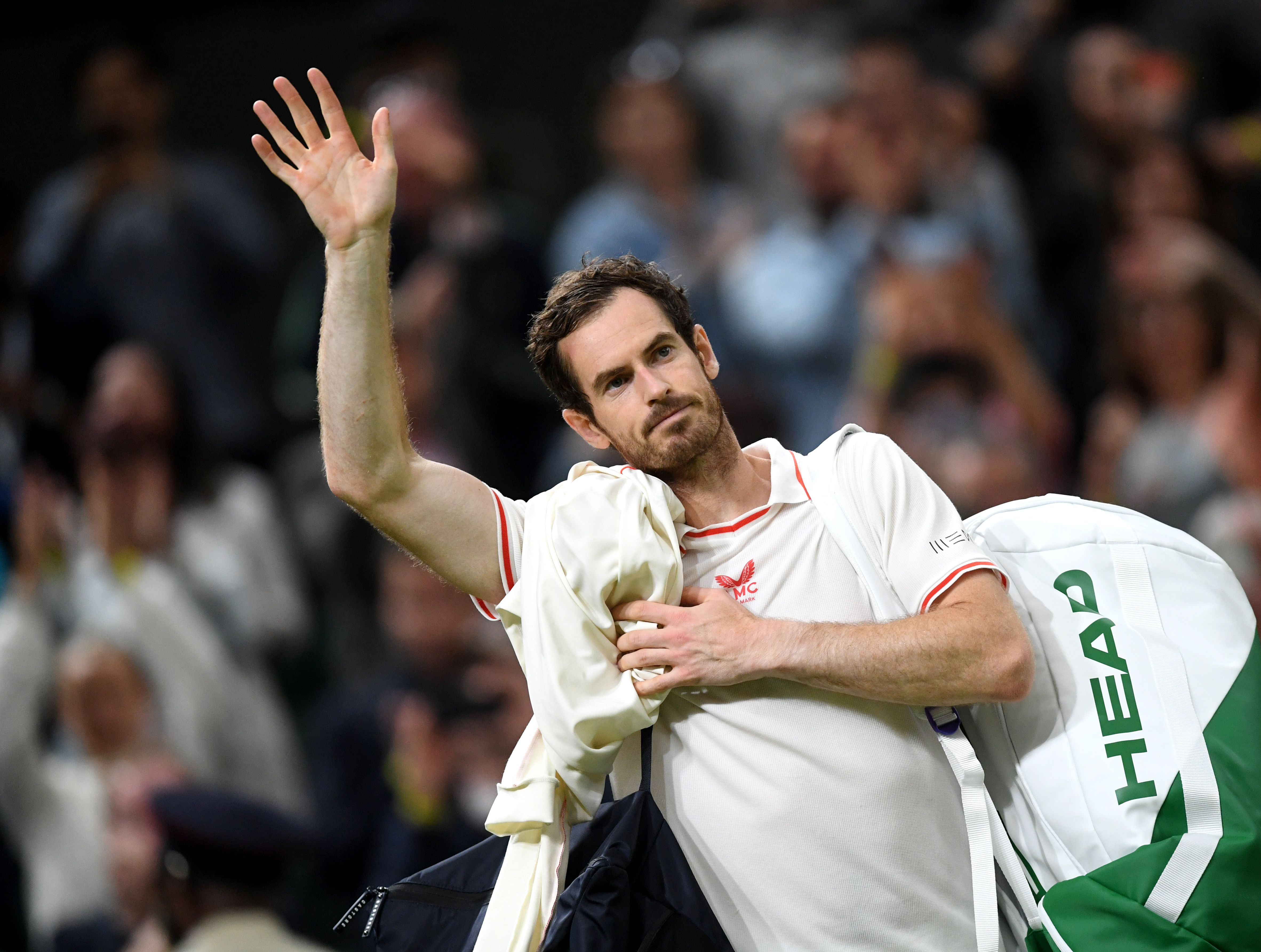epa09314386 Andy Murray of Britain waves to spectators after winning against Oscar Otte of Germany during their second round match at the Wimbledon Championships, Wimbledon, Britain 30 June 2021.  EPA-EFE/NEIL HALL   EDITORIAL USE ONLY