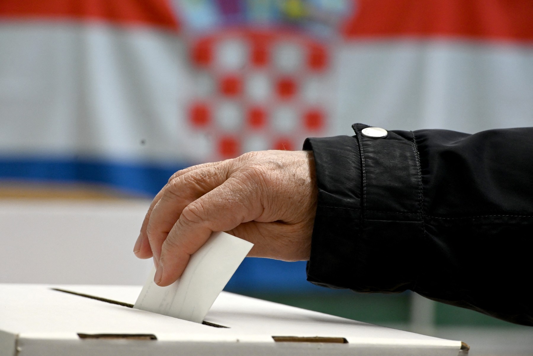 A man casts his ballot at a polling station during the presidential elections on January 5, 2020 in Zagreb, Croatia.,Image: 491106609, License: Rights-managed, Restrictions: , Model Release: no, Credit line: Denis LOVROVIC / AFP / Profimedia