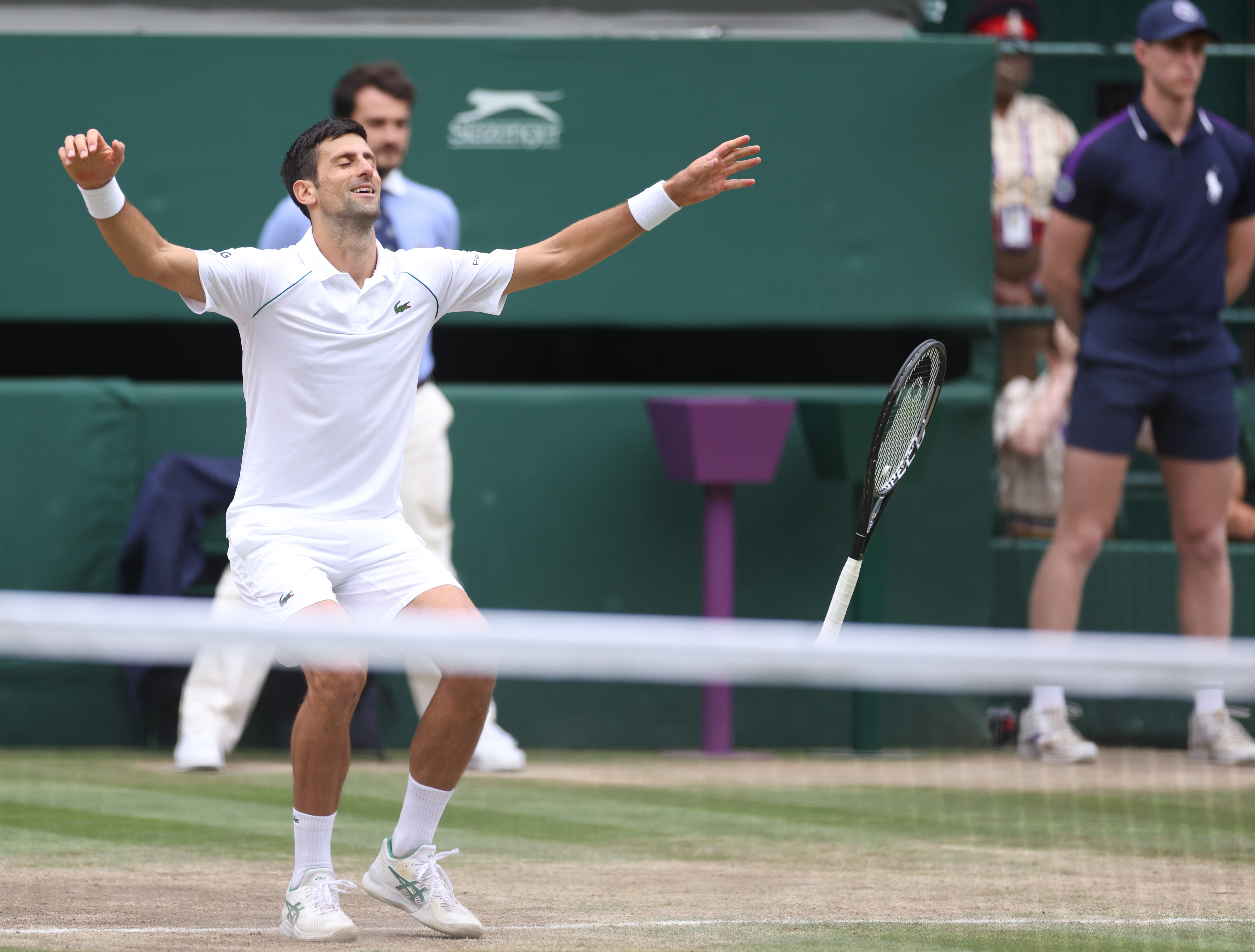 epa09337769 Novak Djokovic of Serbia celebrates after winning the men's final against Matteo Berrettini of Italy at the Wimbledon Championships, Wimbledon, Britain 11 July 2021.  EPA-EFE/STEVE PASTON / POOL   EDITORIAL USE ONLY
