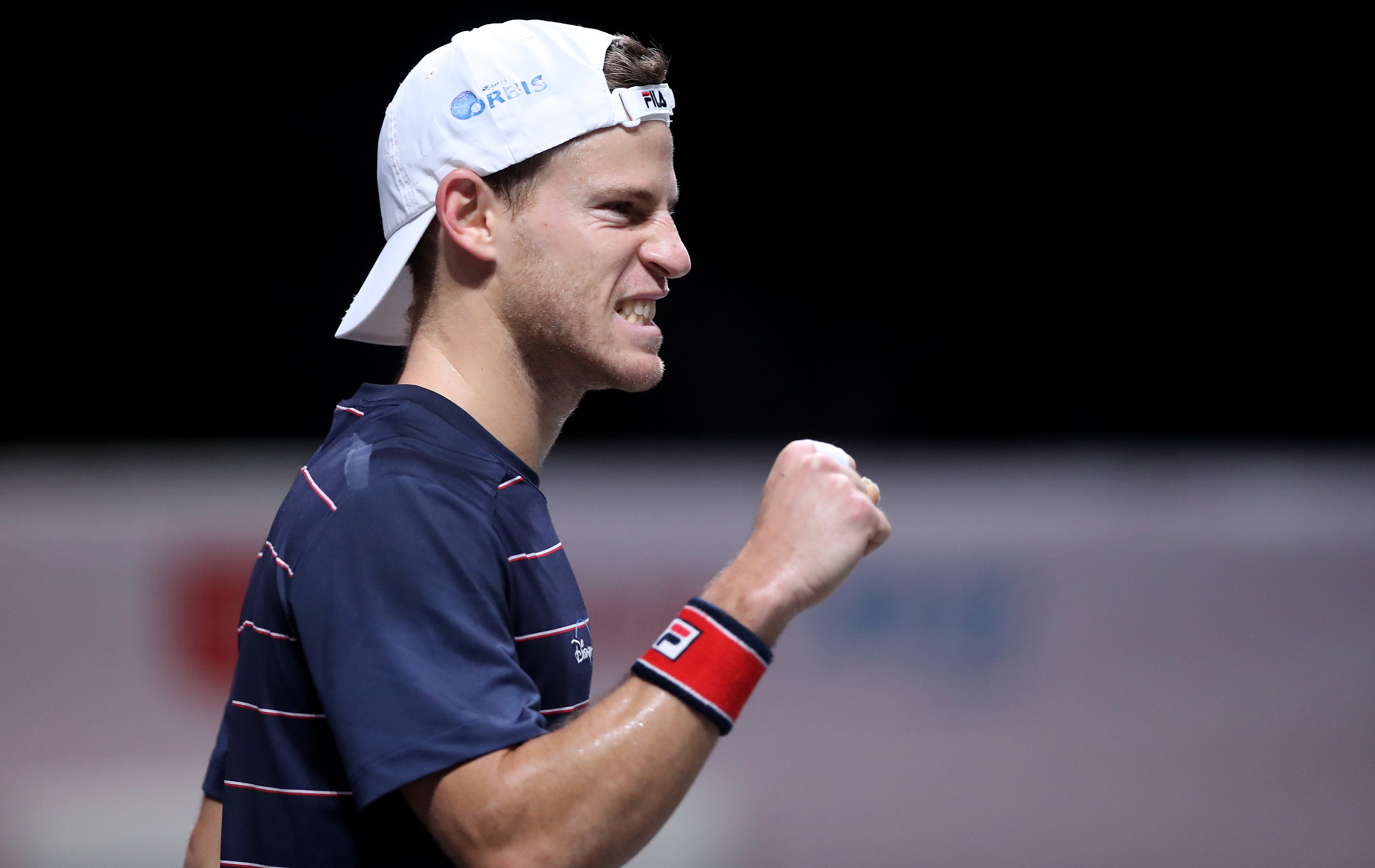 epa08768635 Diego Schwartzman of Argentina celebrates after winning his quarter final match against Alejandro Davidovich Fokina of Spain at the bett1HULKS Championships ATP tennis tournament in Cologne, Germany, 23 October 2020.  EPA-EFE/FRIEDEMANN VOGEL