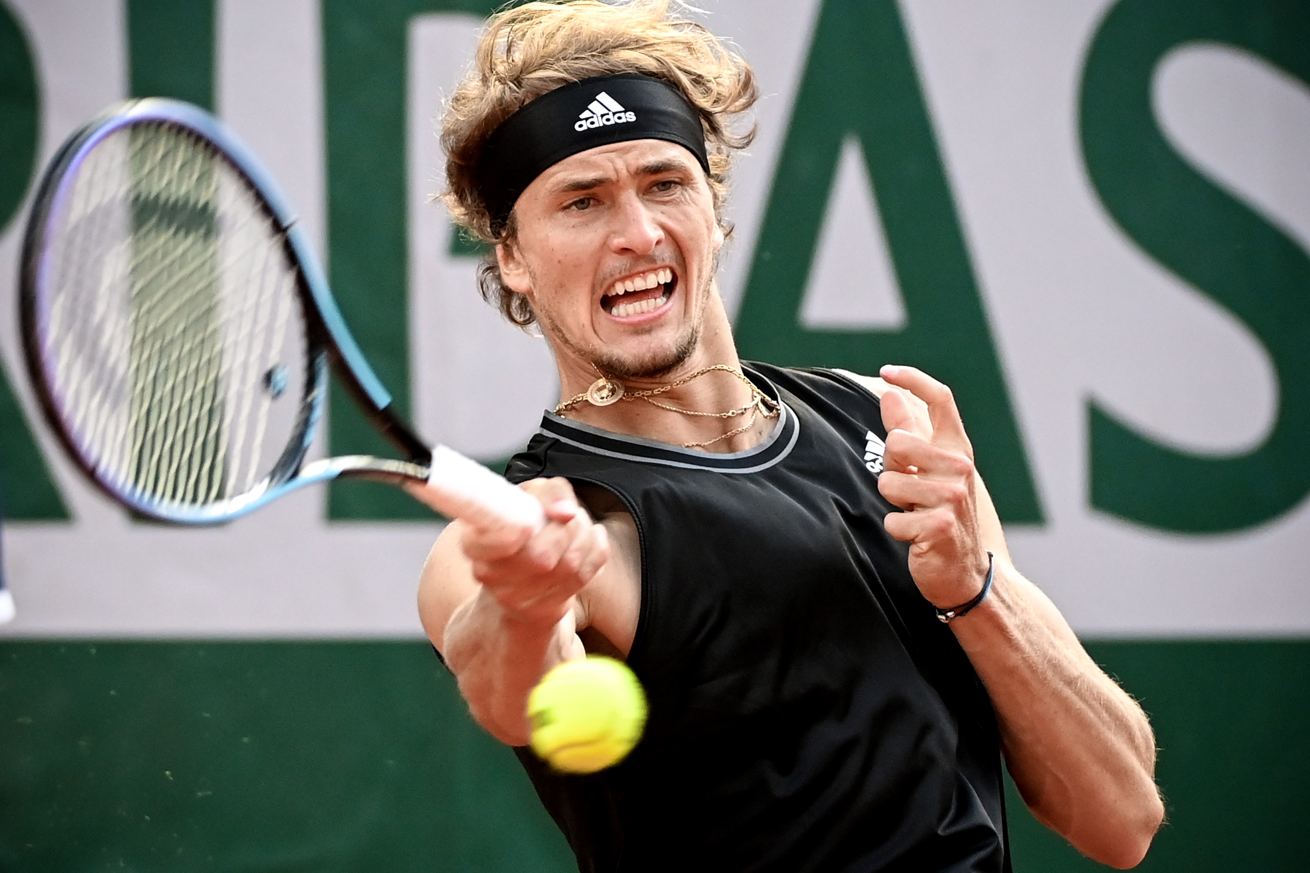epa09255768 Alexander Zverev of Germany hits a forehand during his quarter final match against Alejandro Davidovich Fokina of Spain at the French Open tennis tournament at Roland Garros in Paris, France, 08 June 2021.  EPA-EFE/CAROLINE BLUMBERG