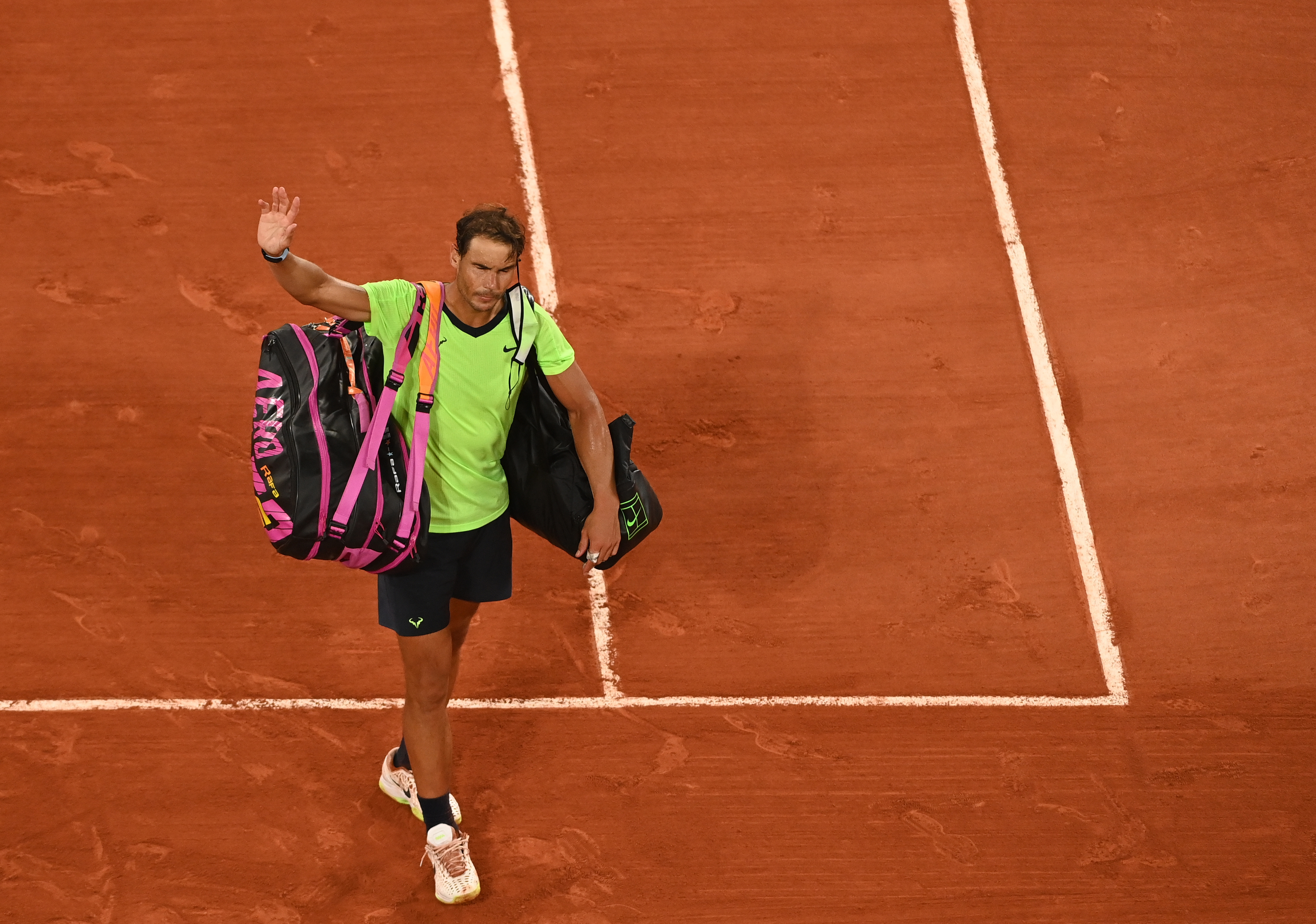 epa09263598 Rafael Nadal of Spain reacts after losing against Novak Djokovic of Serbia during their semi final match at the French Open tennis tournament at Roland Garros in Paris, France, 11 June 2021.  EPA-EFE/CAROLINE BLUMBERG