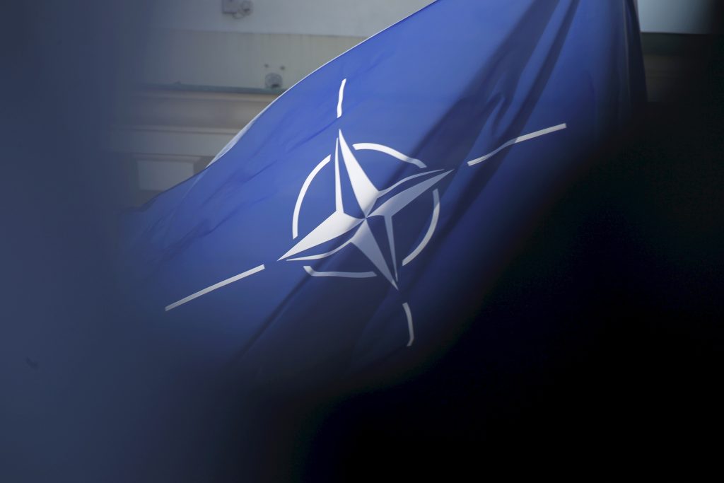 epa07473022 NATO flag during festive public event, the open-air ceremony '15 Years Safe and Secure with NATO!' in Vilnius, Lithuania, 30 March 2019. Lithuania celebrates the 15th anniversary of its membership in NATO.  EPA-EFE/Toms Kalnins