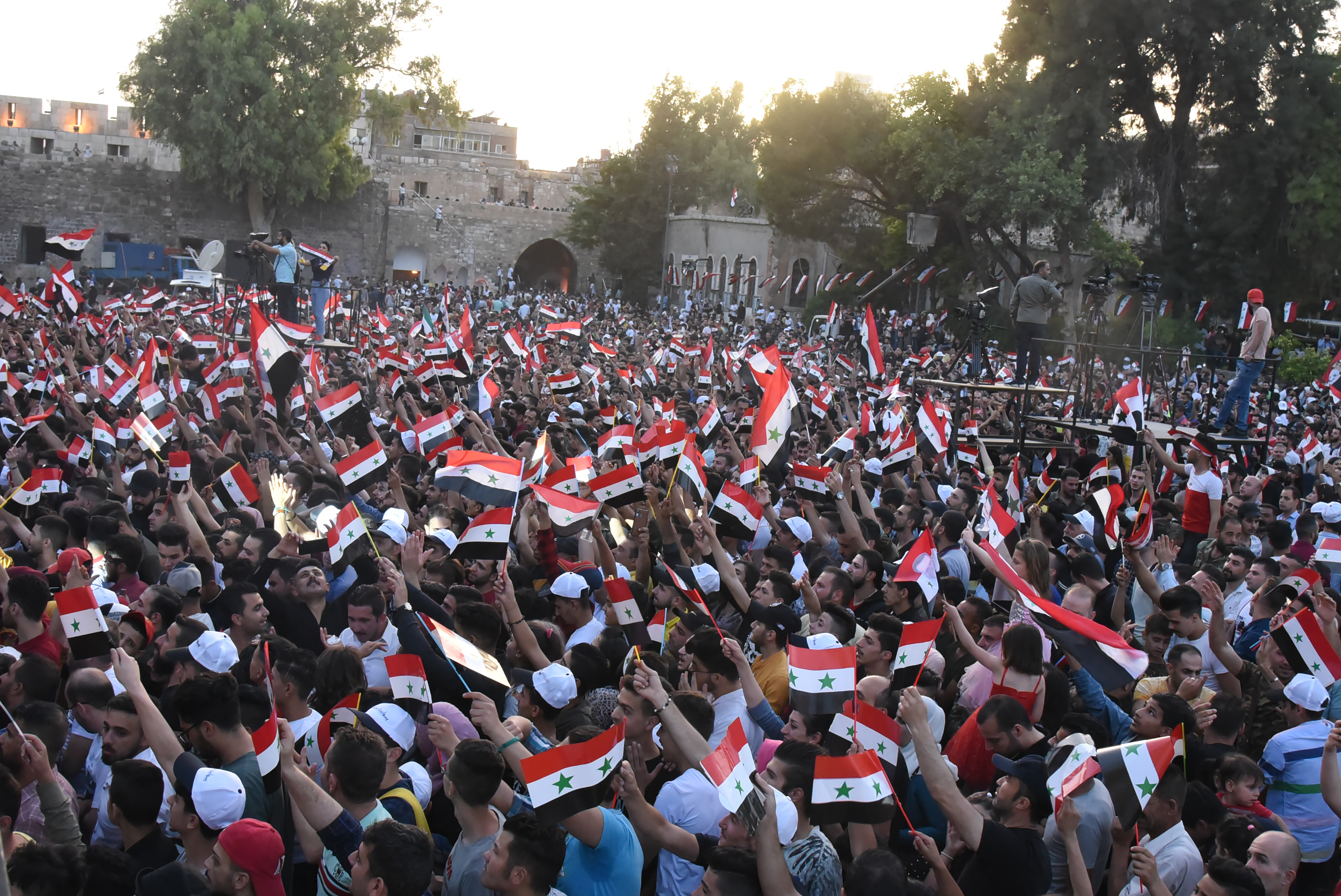 Supporters of Syrian President Bashar Assad celebrate his reelection