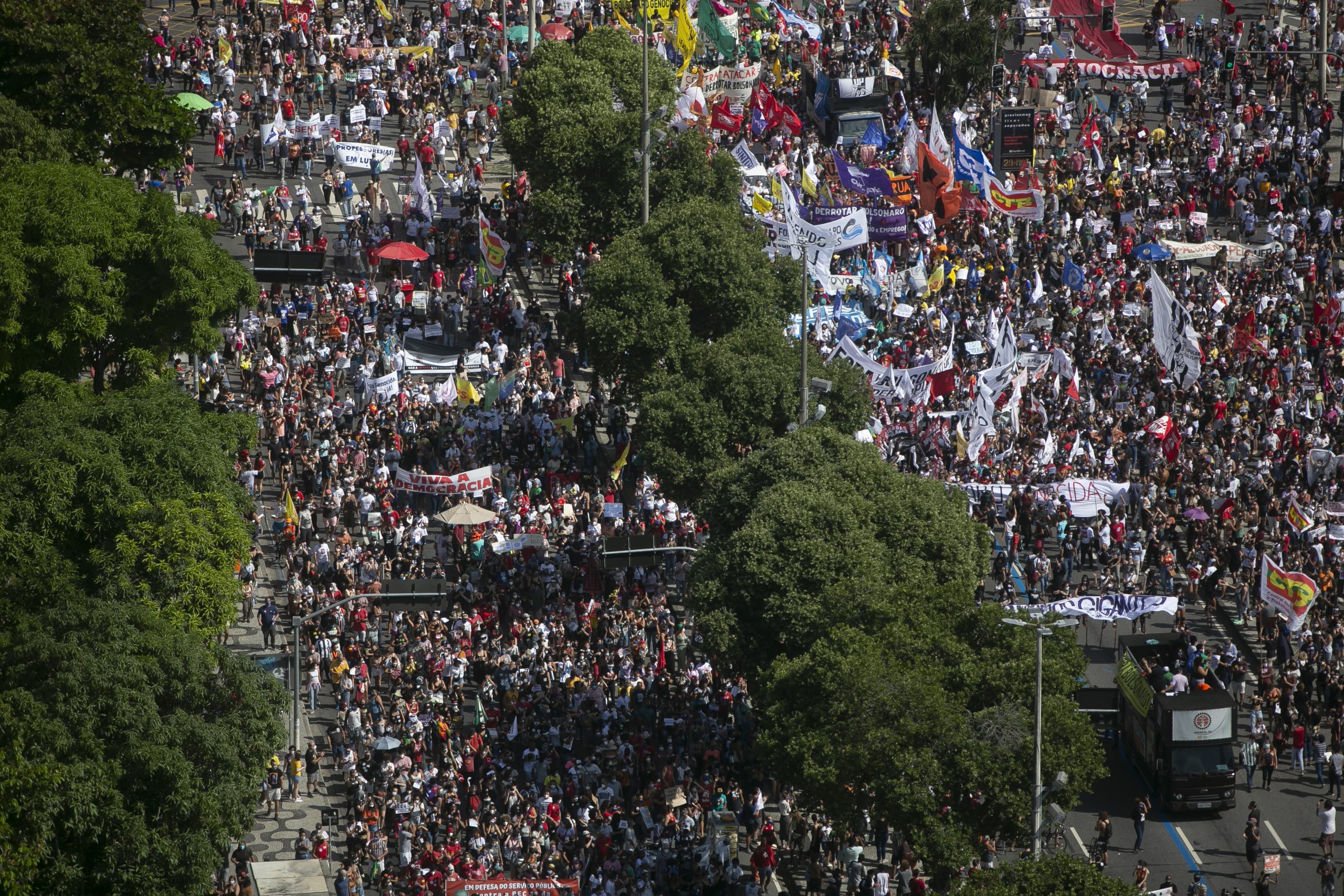 People march in a protest against the government's response in combating COVID-19, demanding the impeachment of President Jair Bolsonaro, in Rio de Janeiro, Brazil, Saturday, May 29, 2021. (AP Photo/Bruna Prado)